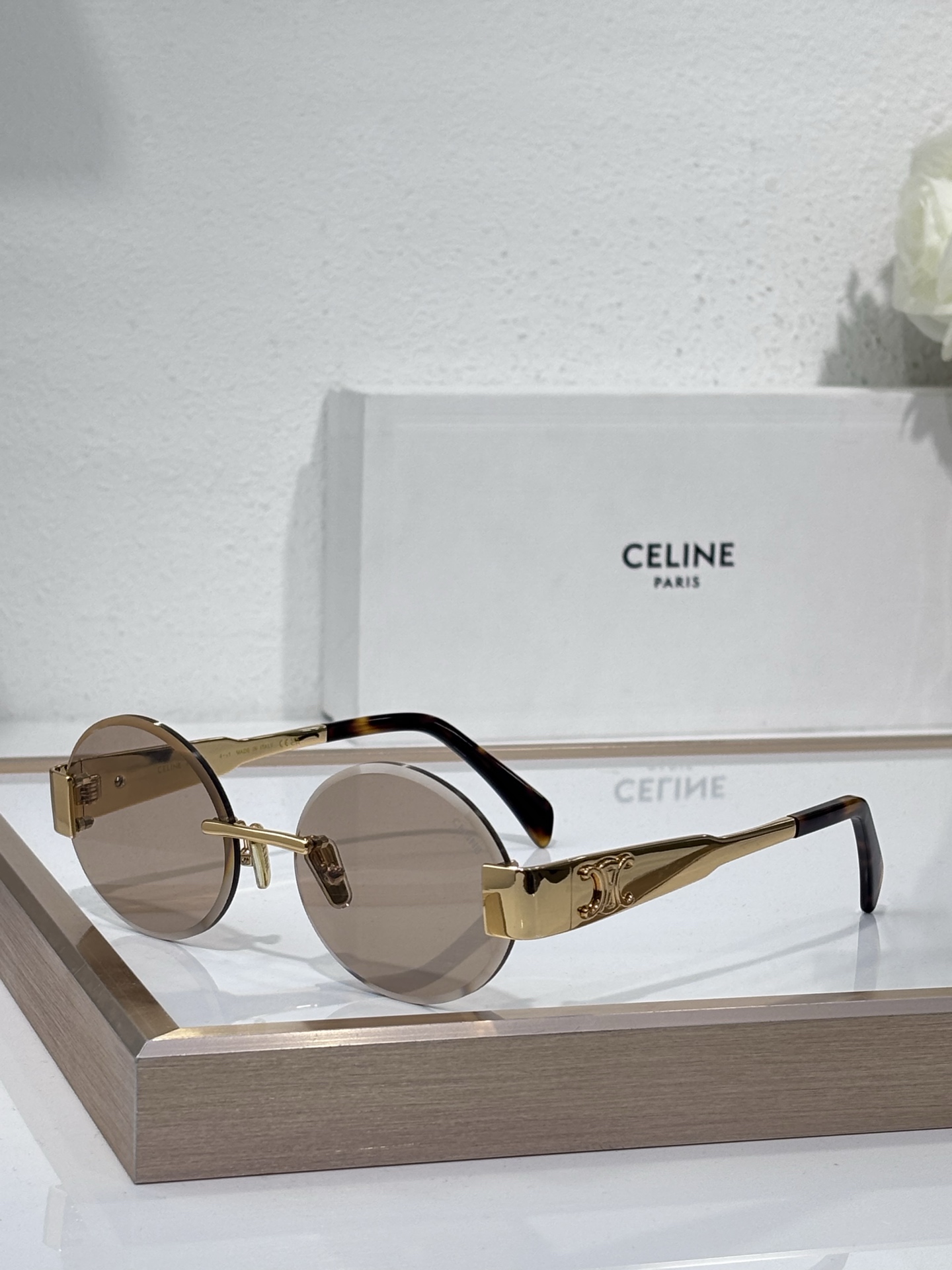 Celine Rimless Round Rose - Gold - Tone Metal Sunglasses with Triomphe & Burgundy Accents (Model: CL4122)