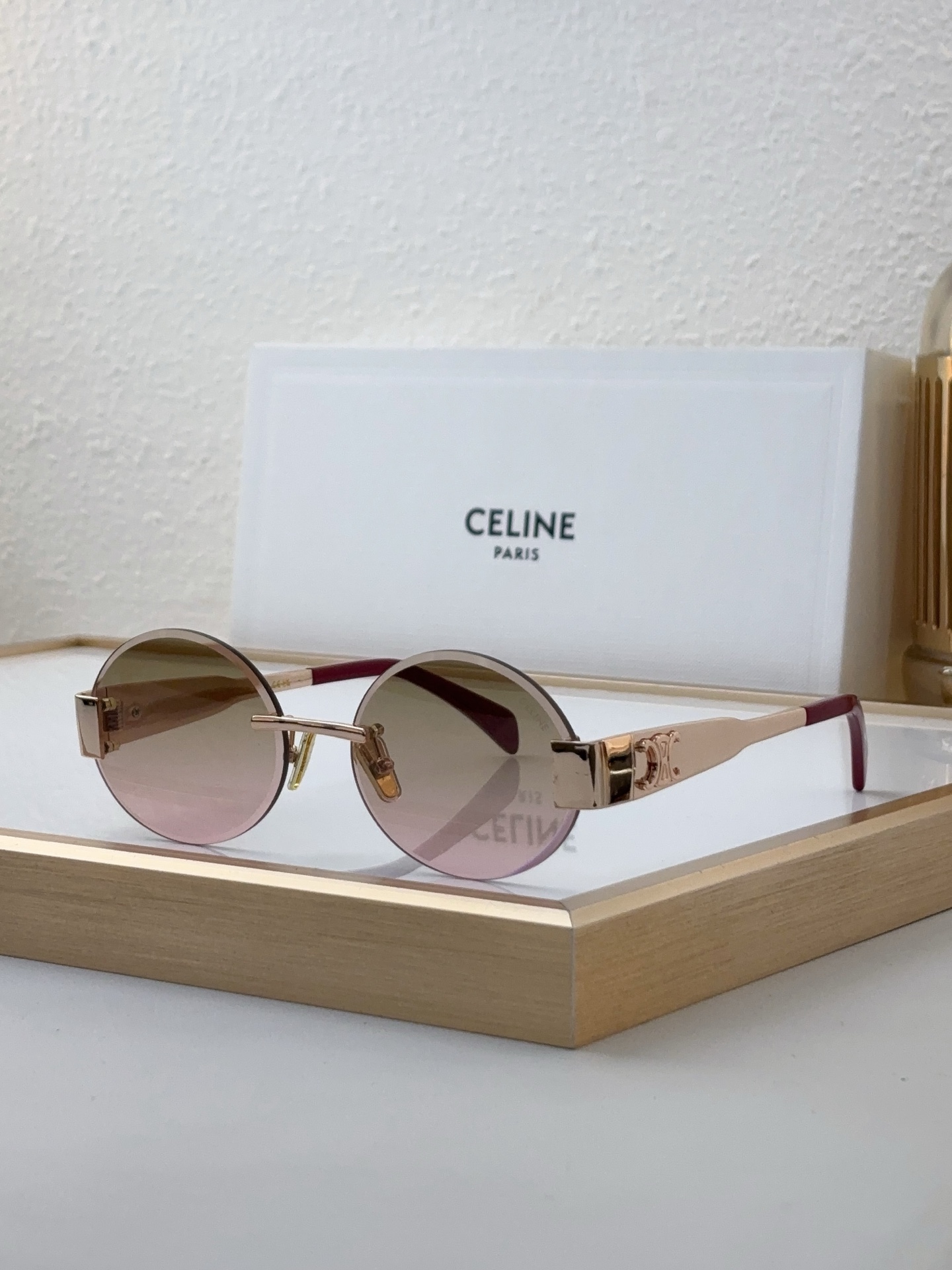 Celine Rimless Round Gold - Tone Metal Sunglasses with Triomphe Accents (Model: CL4121)