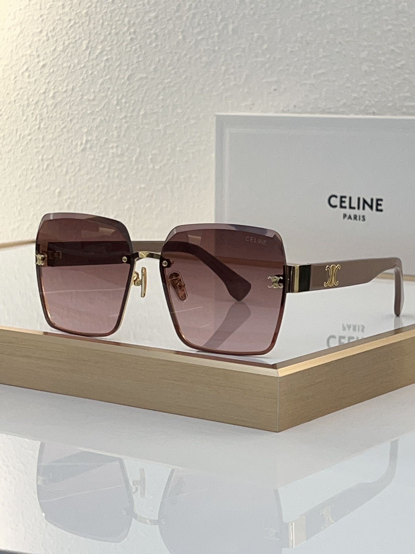 Celine Square Semi - Rimless Sunglasses with Gold Triomphe Accents (Model: CL4052)