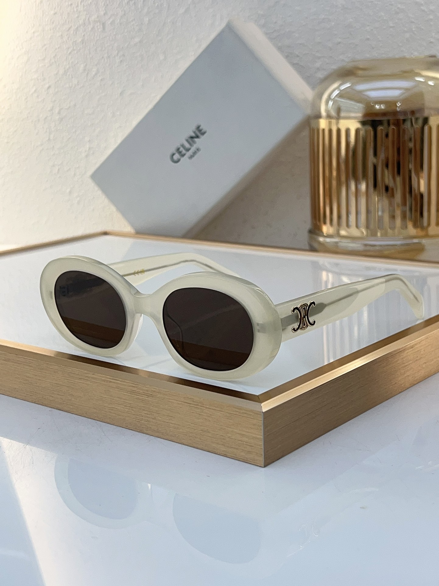 Celine Oval Sunglasses with Milky Acetate Frame & Gold Triomphe Accents (Model: CL4040)