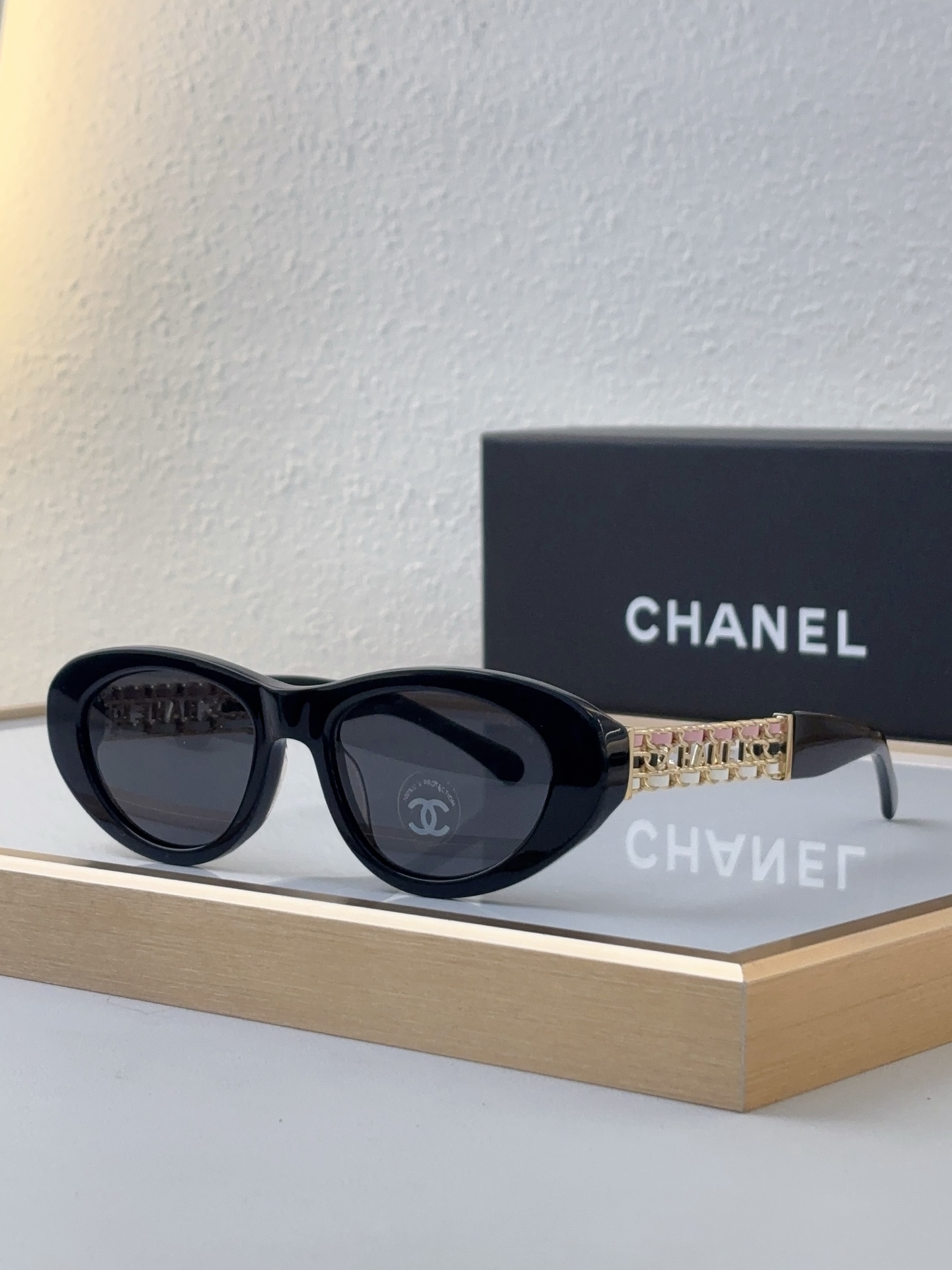 Chanel Burgundy Acetate Oval Sunglasses with Gold - Tone Chain, Red Accents & CC Motifs (Model: CH5537)