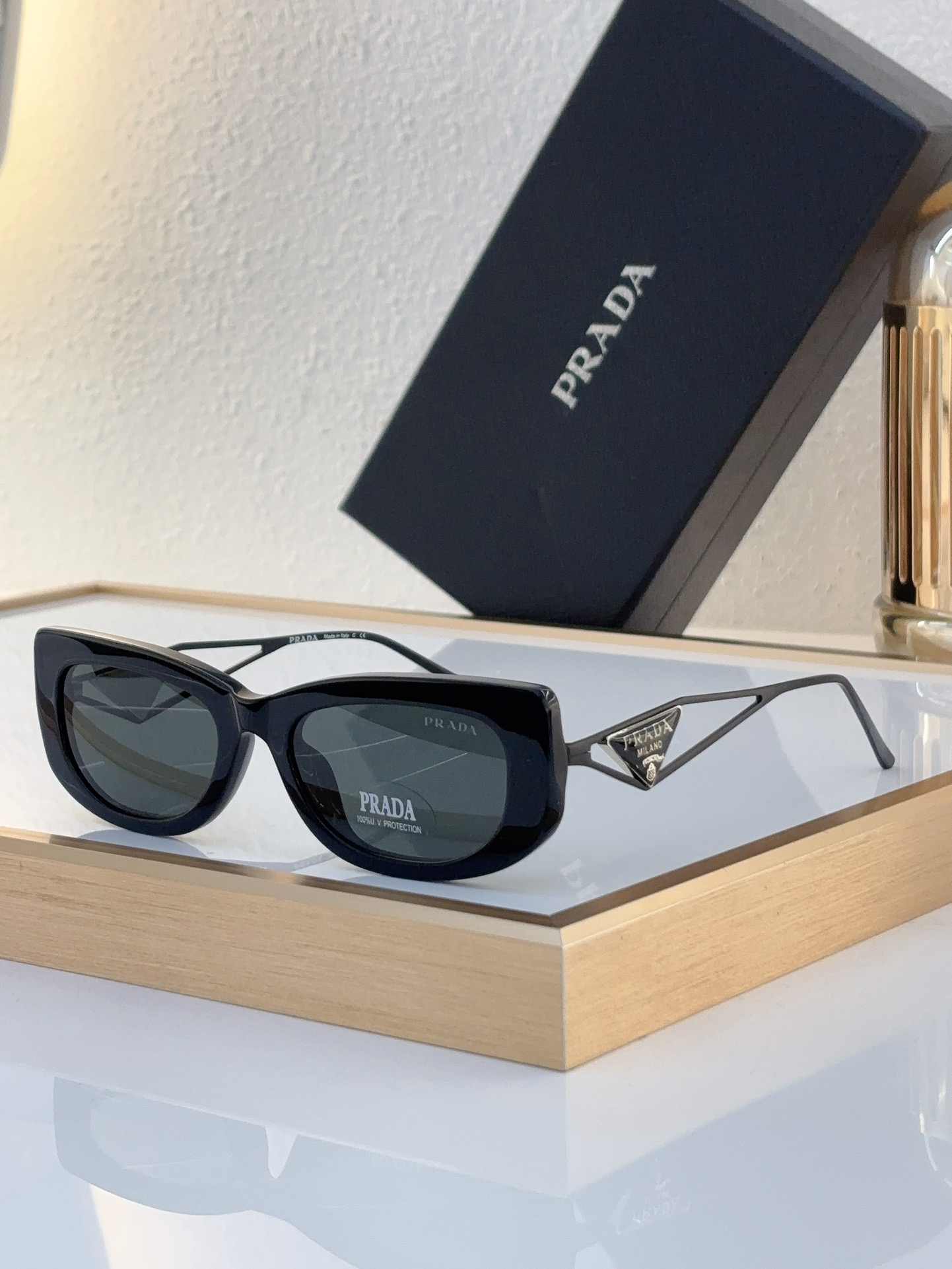 Prada Black Acetate Cat - Eye Sunglasses with Metal Triangle Accents (Model: PR14169S)