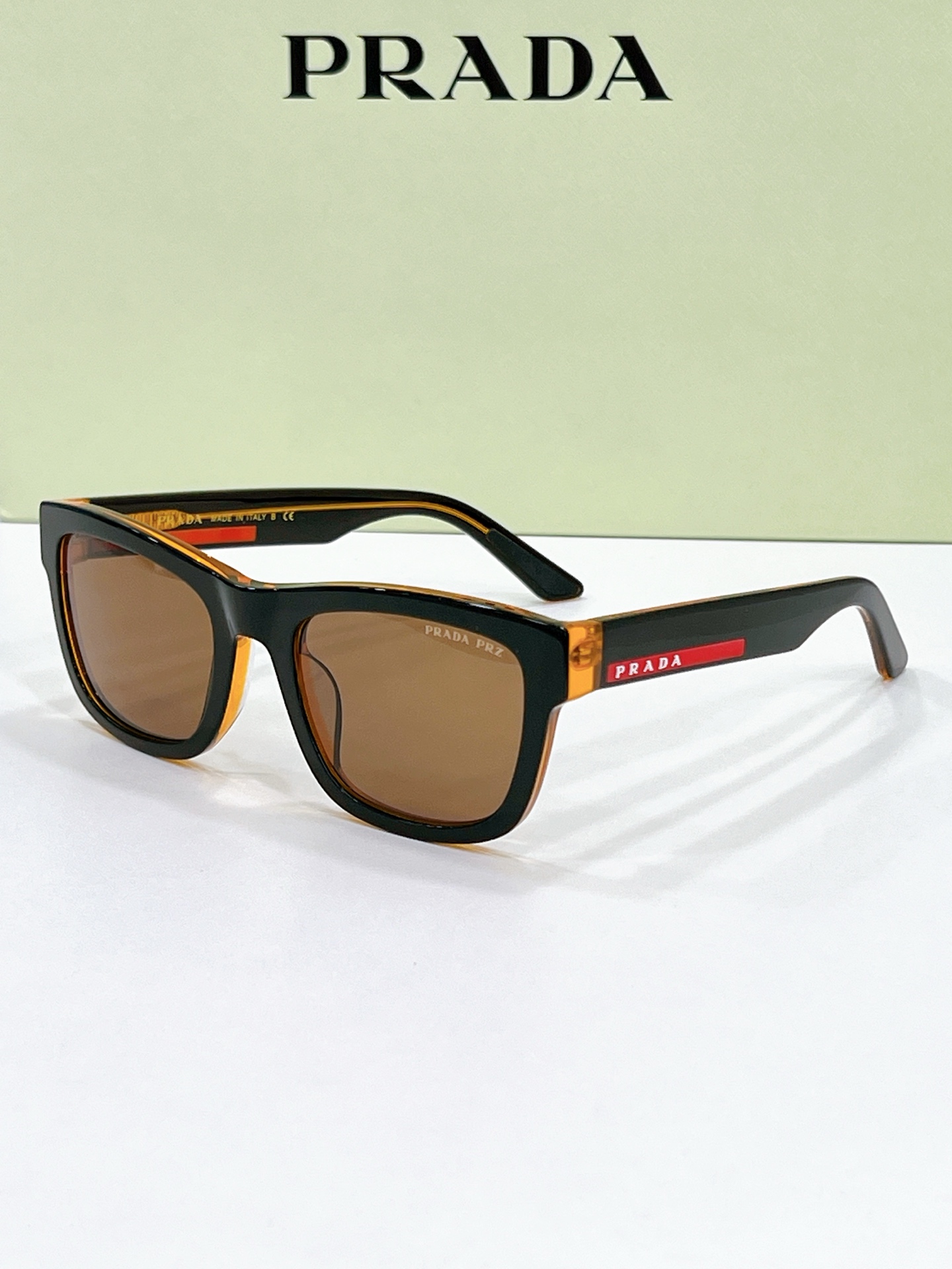 Prada Black - Amber Acetate Square Sunglasses with Red Accents (Model: PR11670S)
