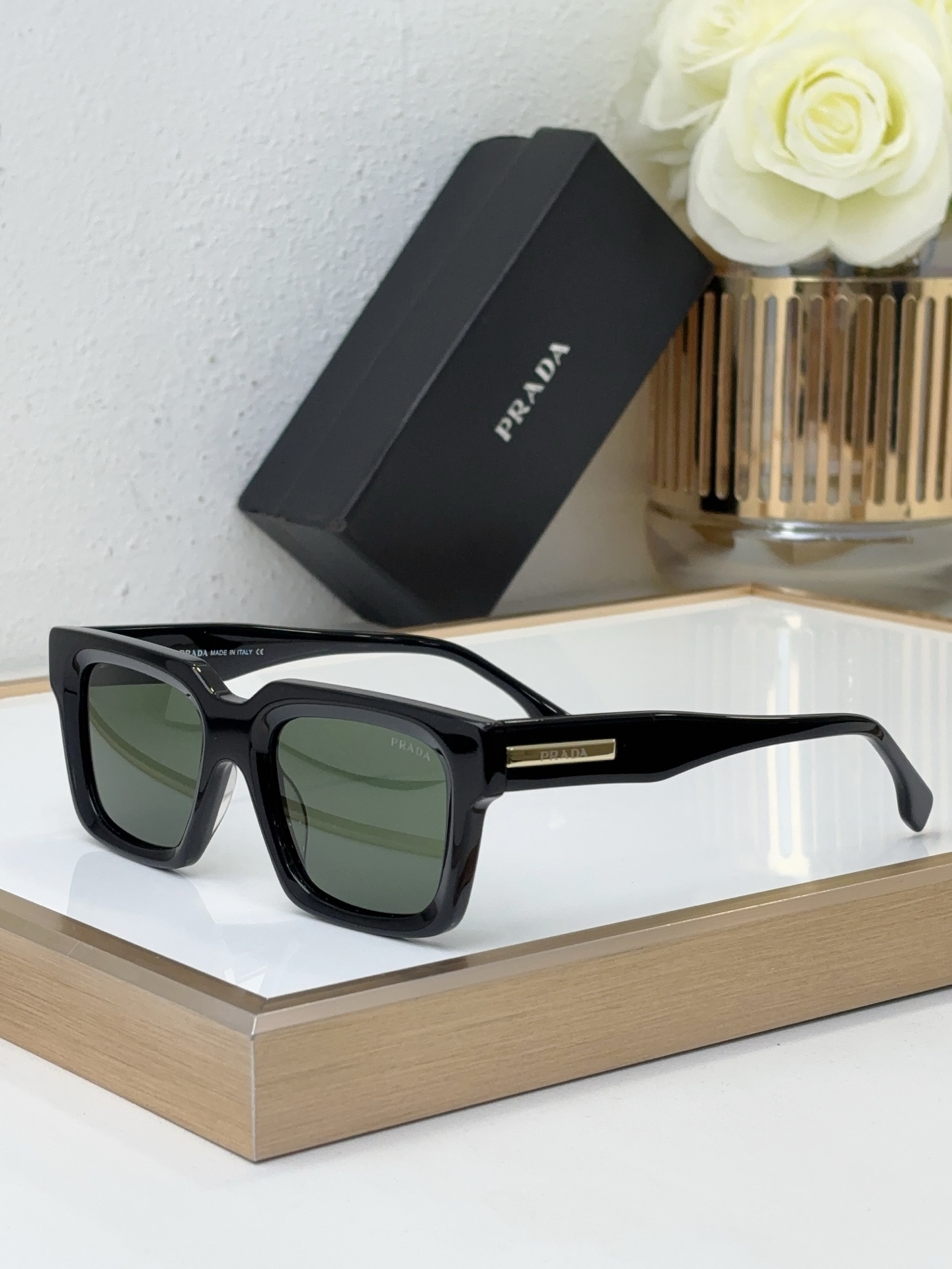 Prada Black Acetate Square Sunglasses with Gold Metal Accents (Model: PR10569S)
