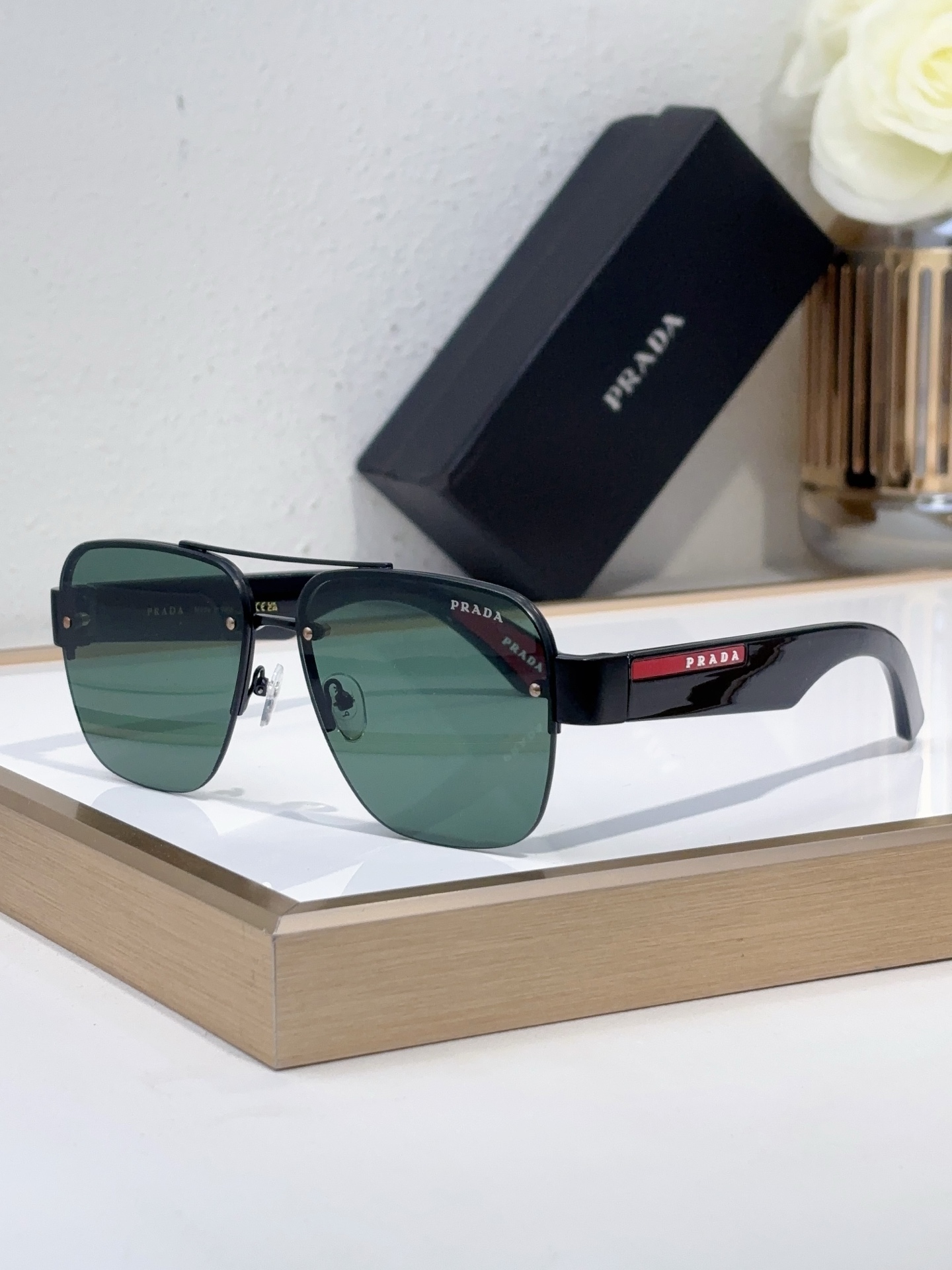 Prada Black - Tone Metal Aviator Sunglasses with Red Accents (Model: PR6236S)