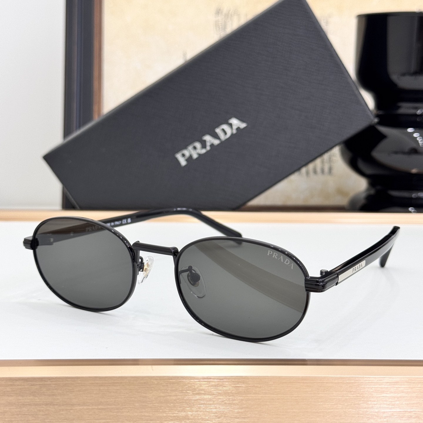 Prada Black Metal Oval Sunglasses (Model: PR6677S)