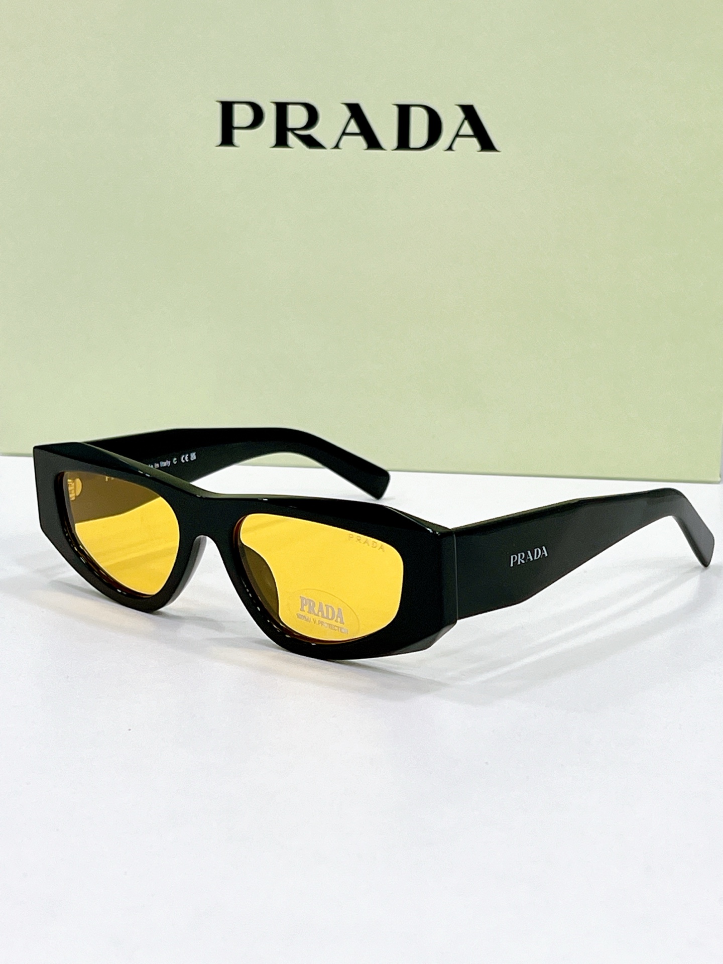 Prada Black Acetate Angular Sunglasses with Yellow Lenses (Model: PR01XS)