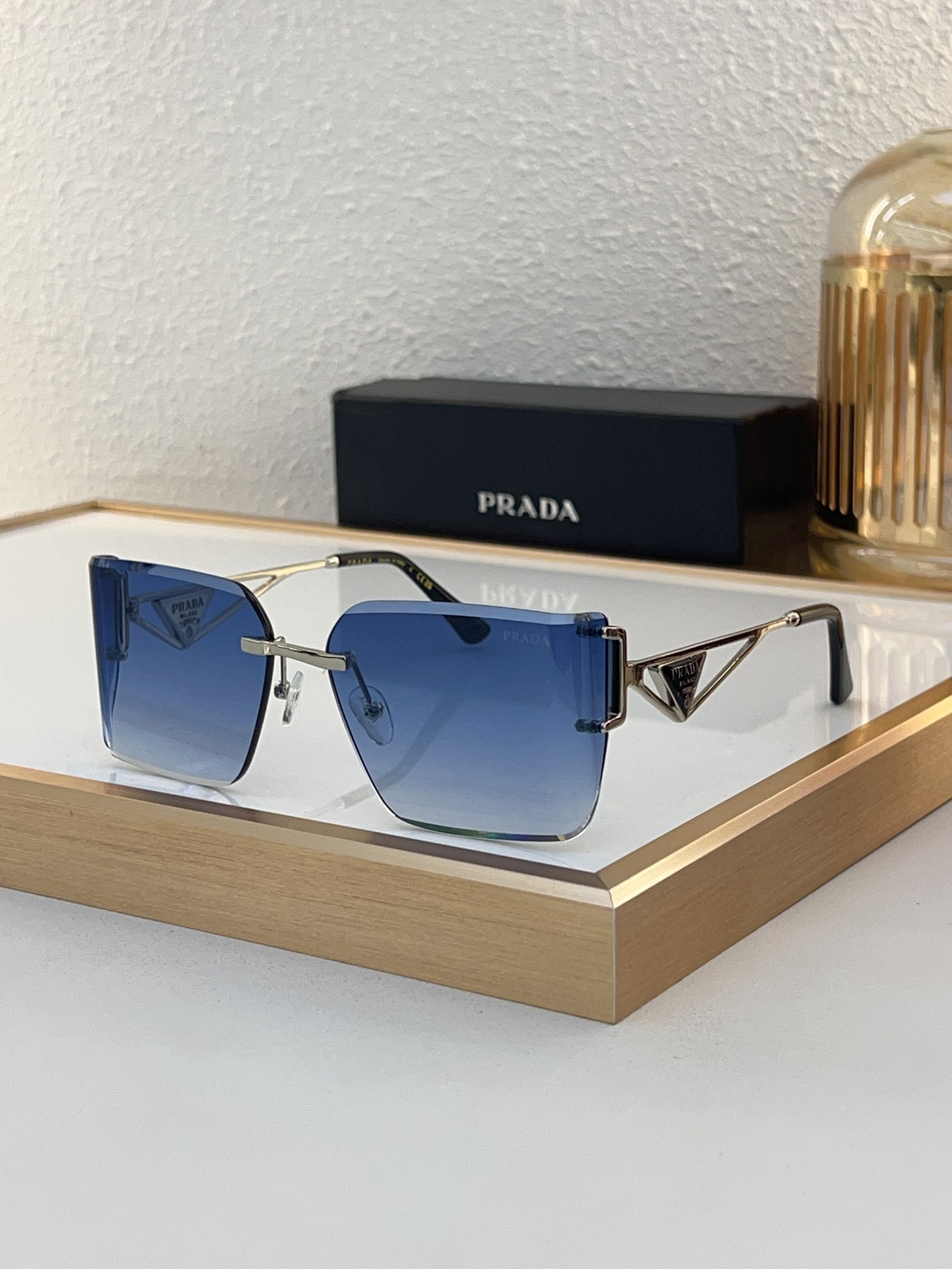 Prada Square Rimless Sunglasses with Gradient Blue Lenses (Model: PR0002S)