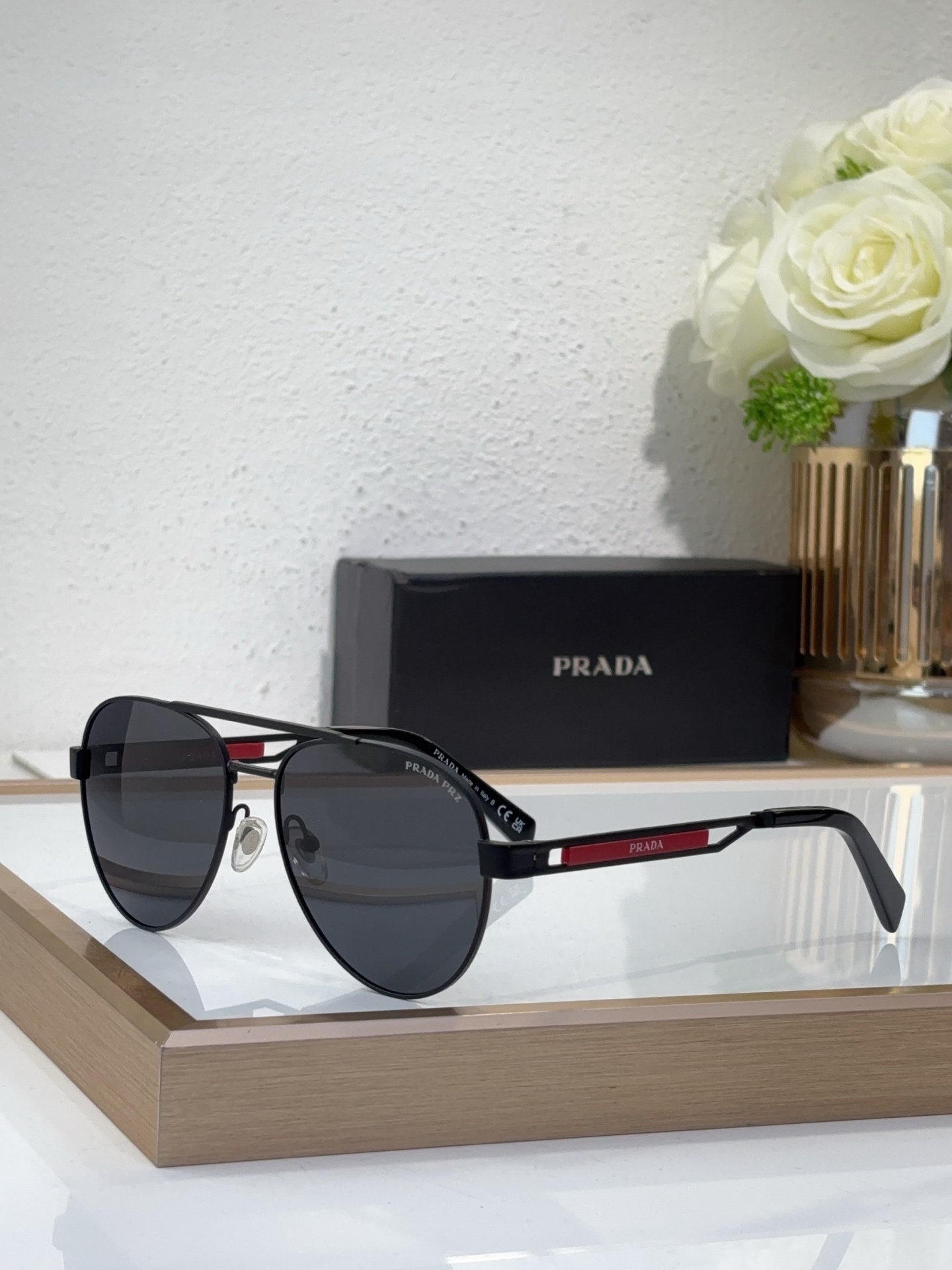 Prada Black - Metal Aviator Sunglasses with Red Accents (Model: PR9012S)