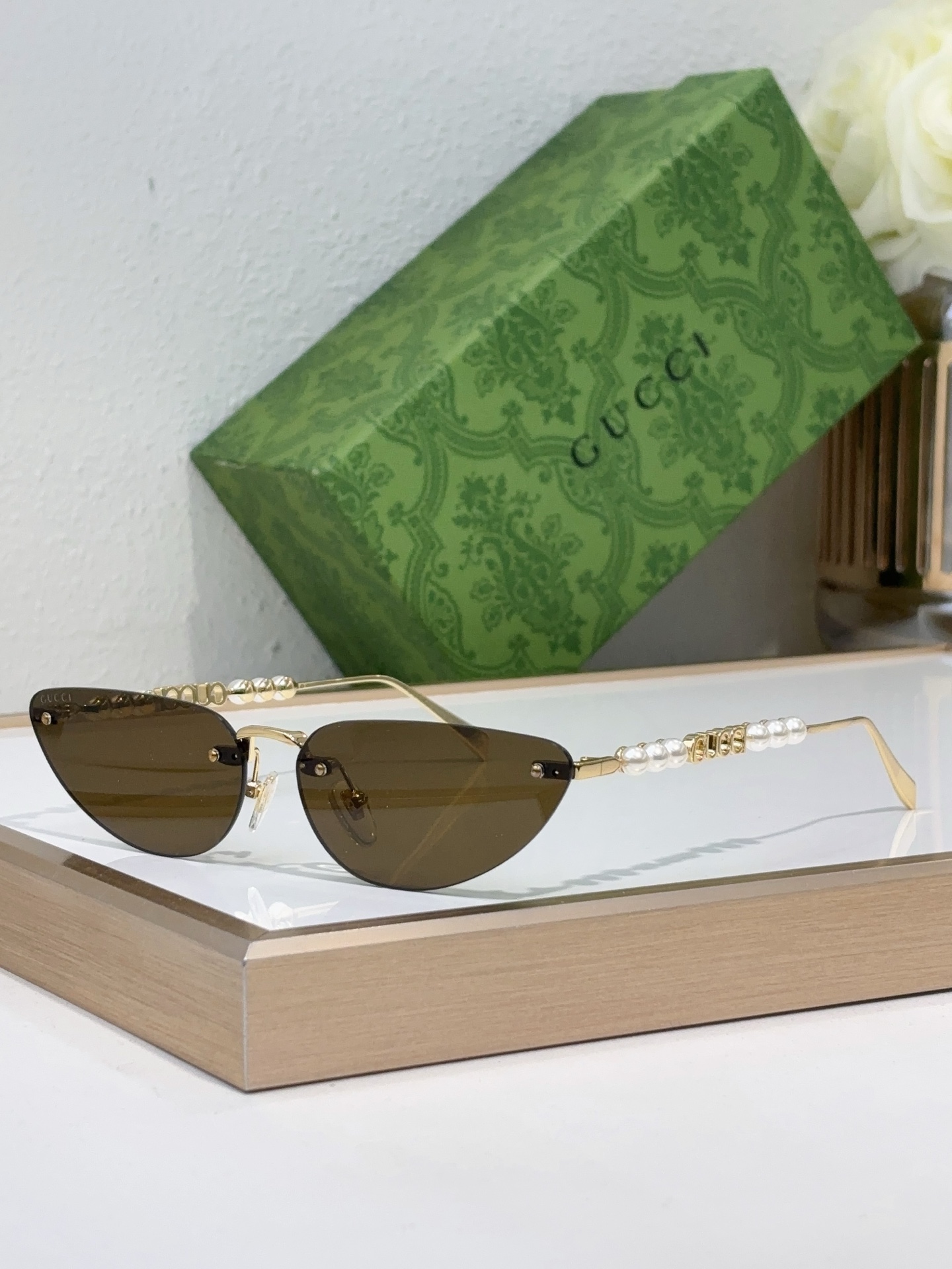 Gucci Gold - Tone Metal Cat - Eye Sunglasses with Pearl & Double G Accents (Model: GG1341S)