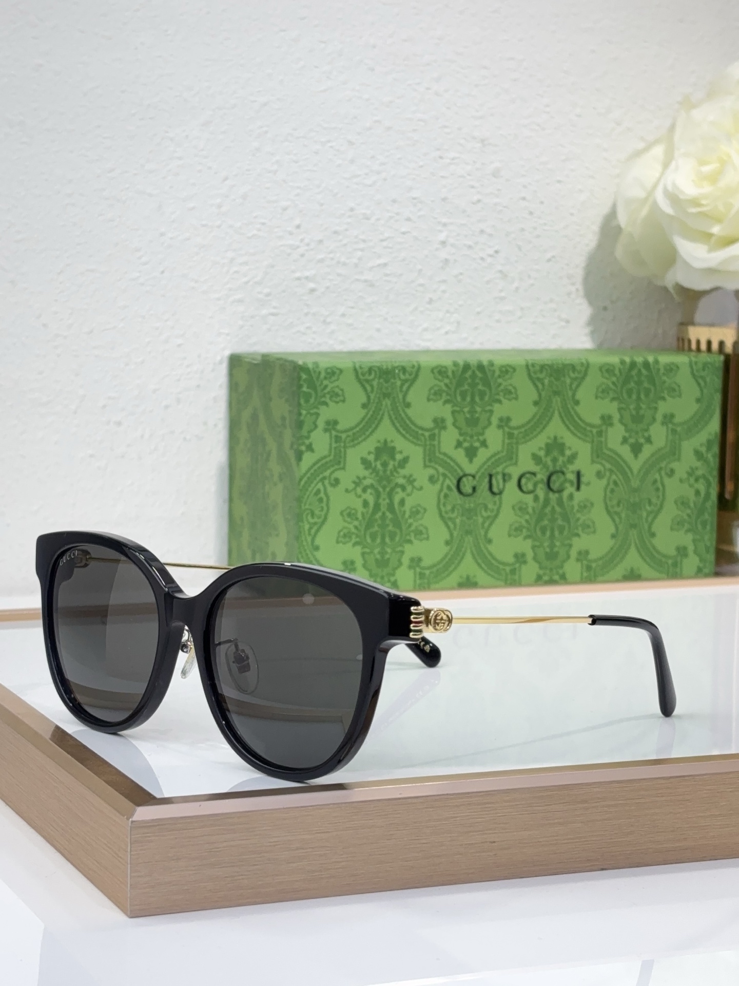 Gucci Black Acetate Cat - Eye Sunglasses with Gold - Tone Accents (Model: GG1327S)