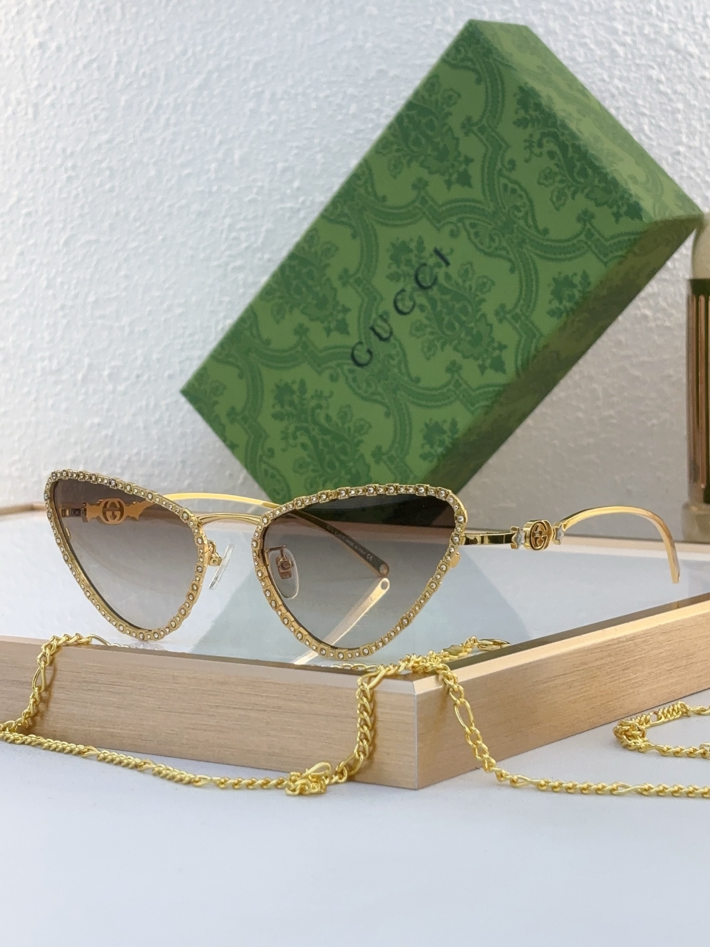Gucci Triangle Sunglasses with Crystal - Embellished Gold - Tone Metal Frame & Chain (Model: GG3000S)