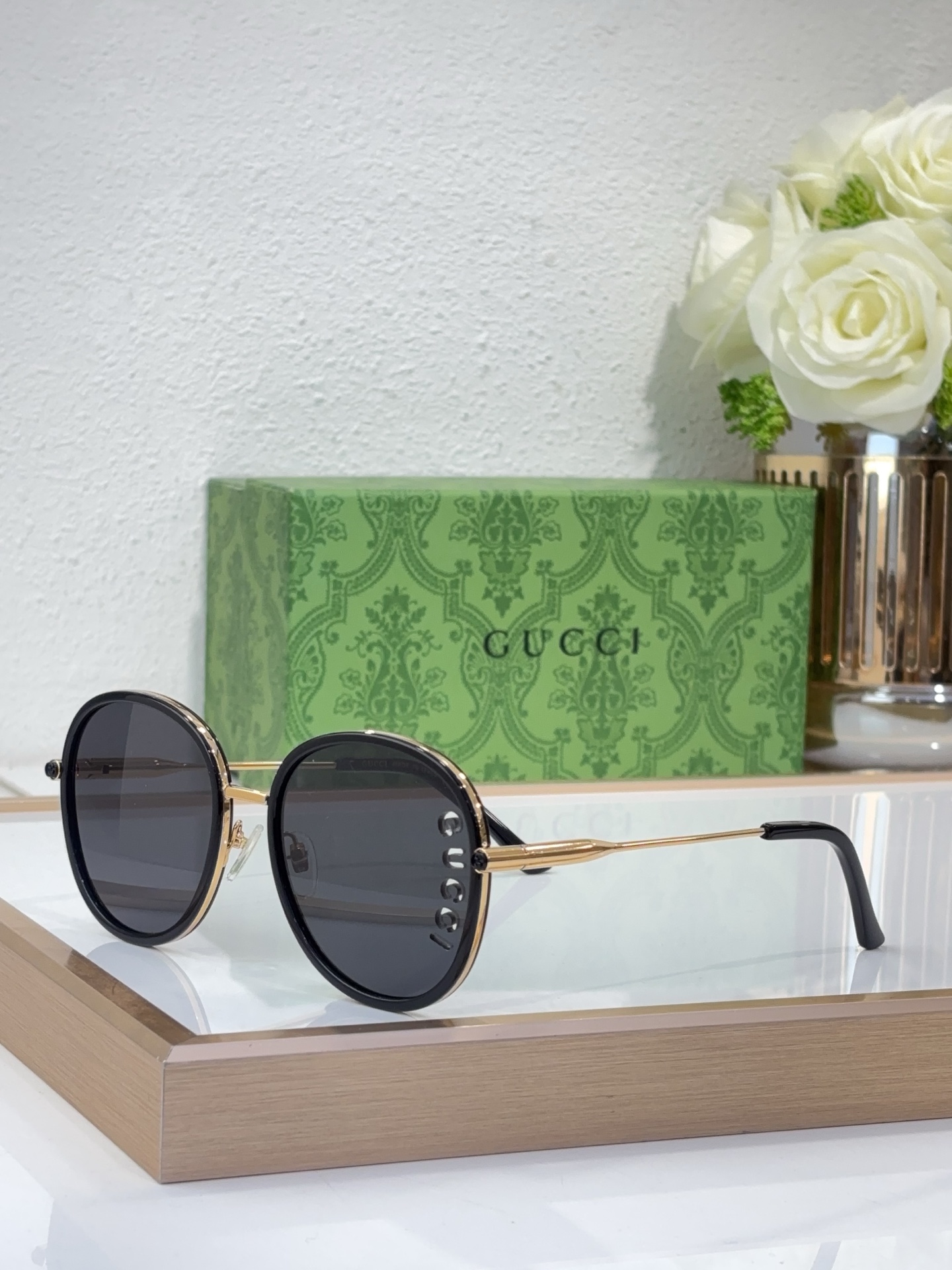 Gucci Round Sunglasses with Gold - Tone Metal Accents and Black Acetate Frame (Model: GG1580S)