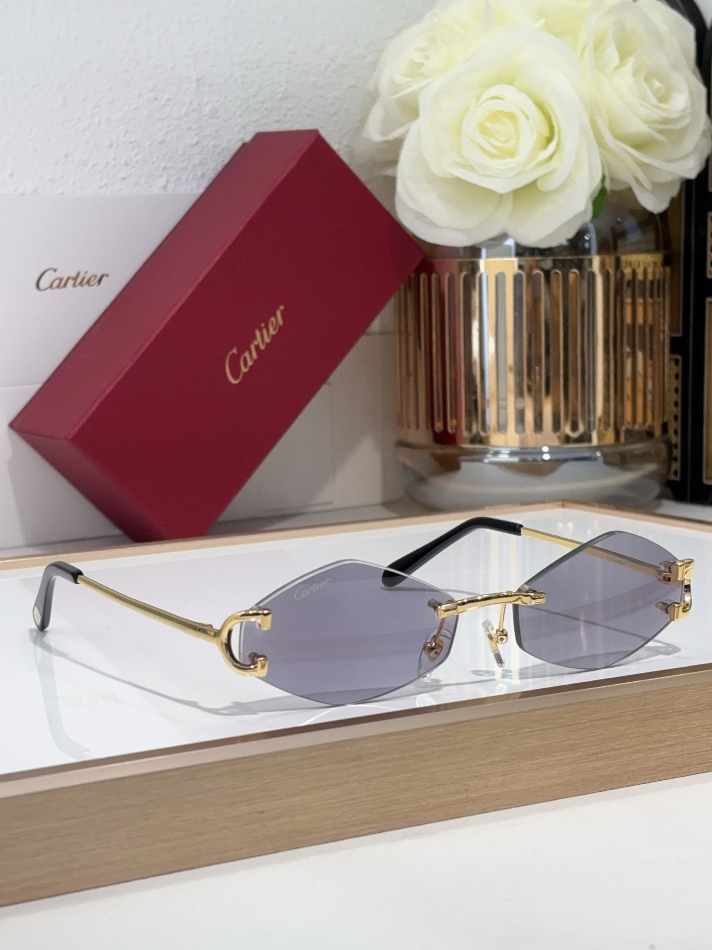 Cartier CT0686S Rimless Oval Sunglasses