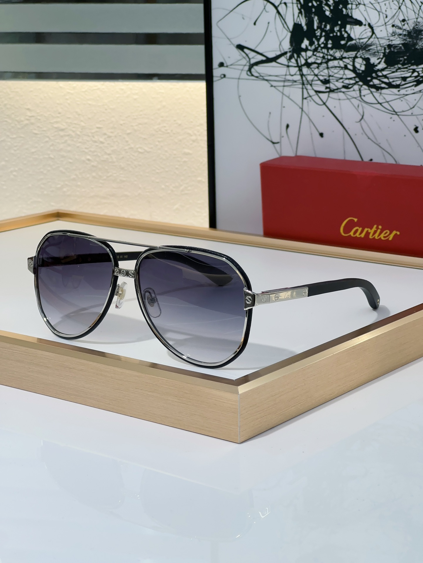 Cartier CT0669S Aviator Sunglasses with Silver - Tone Metal Frame, Black Accents & Gradient Gray Lenses