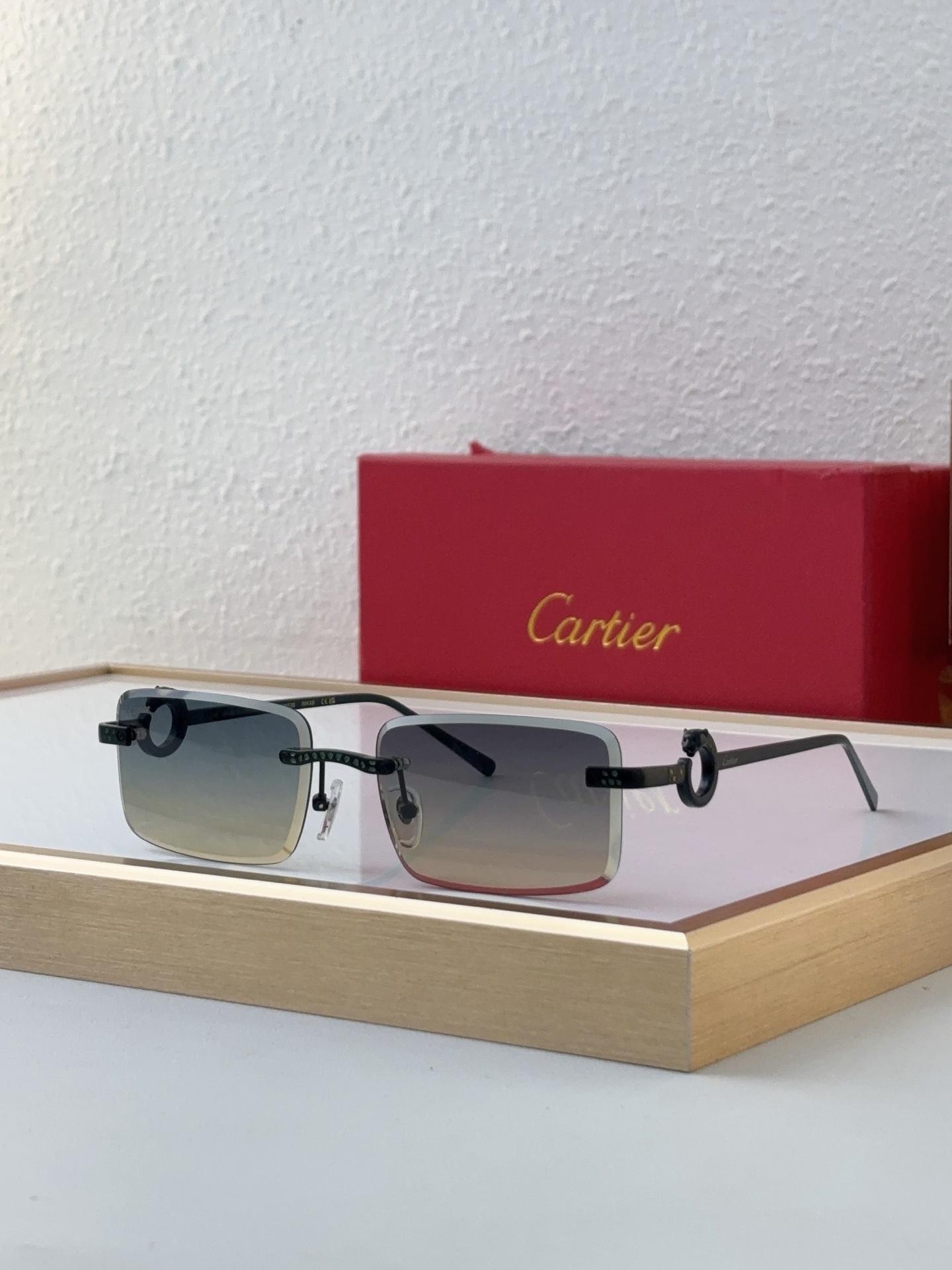 Cartier CT0647S Rimless Square Sunglasses with Gold Ornamental Accents & Gradient Brown Lenses