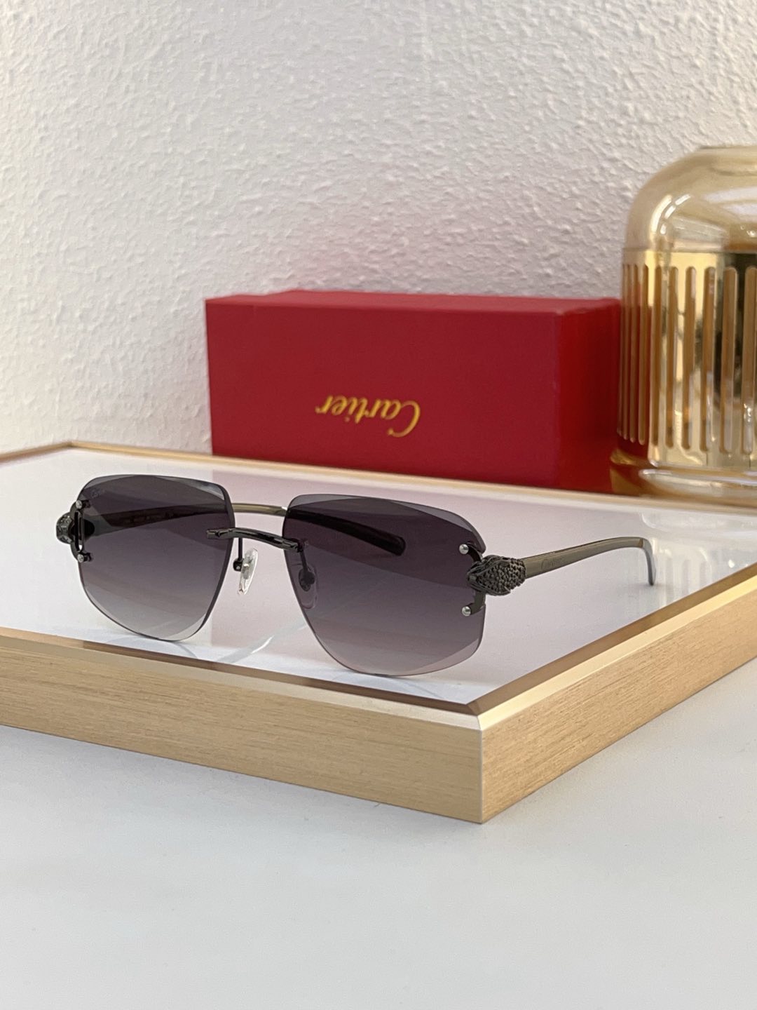 Cartier Rimless Square Sunglasses with Gradient Purple Lenses and Ornate Gold Accents