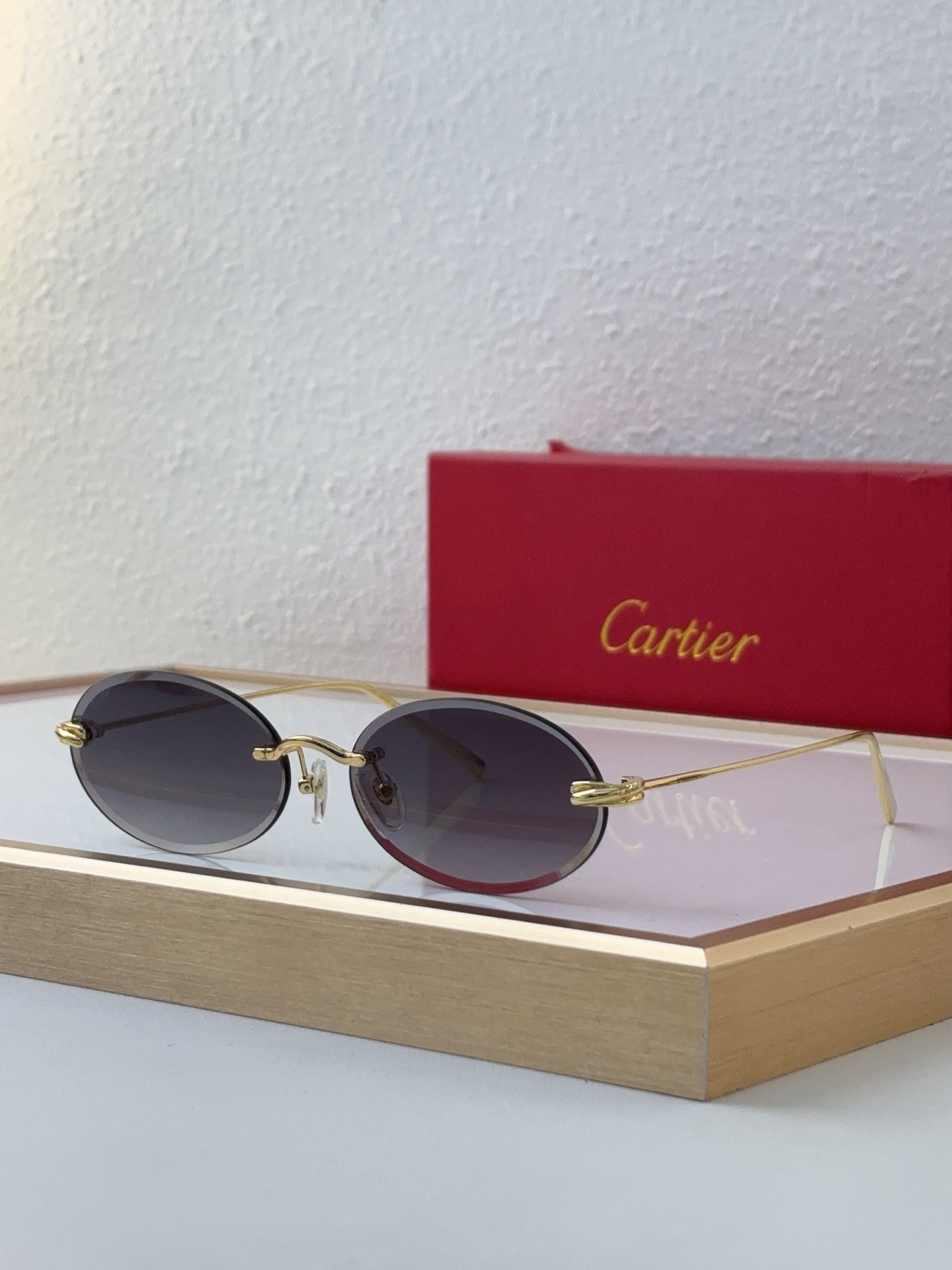 Cartier CT0072S Rimless Oval Sunglasses