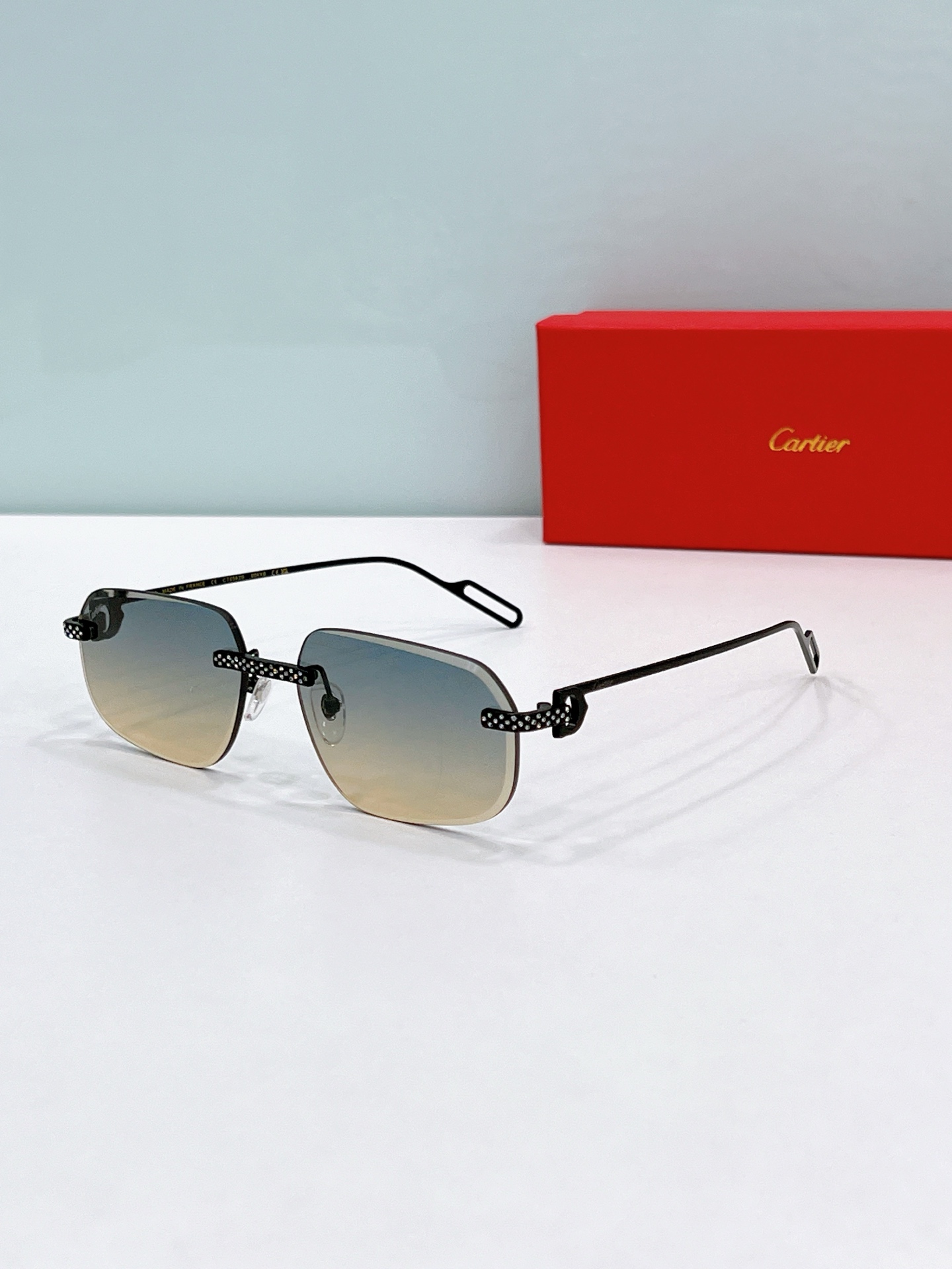 Cartier CT0071S Rimless Rectangular Sunglasses with Crystal Embellishments
