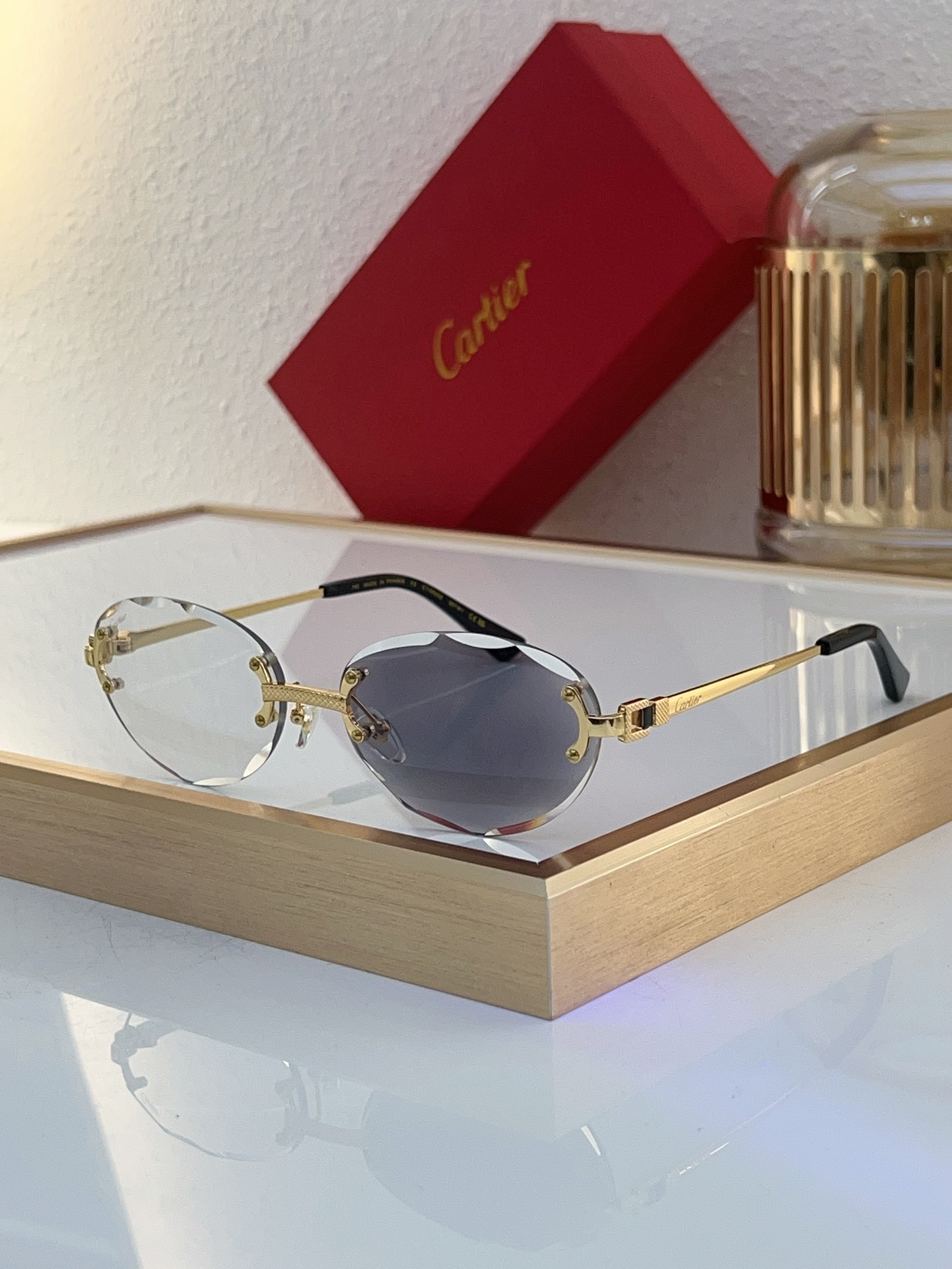 Cartier CT0055S Oval - Shaped Rimless Sunglasses