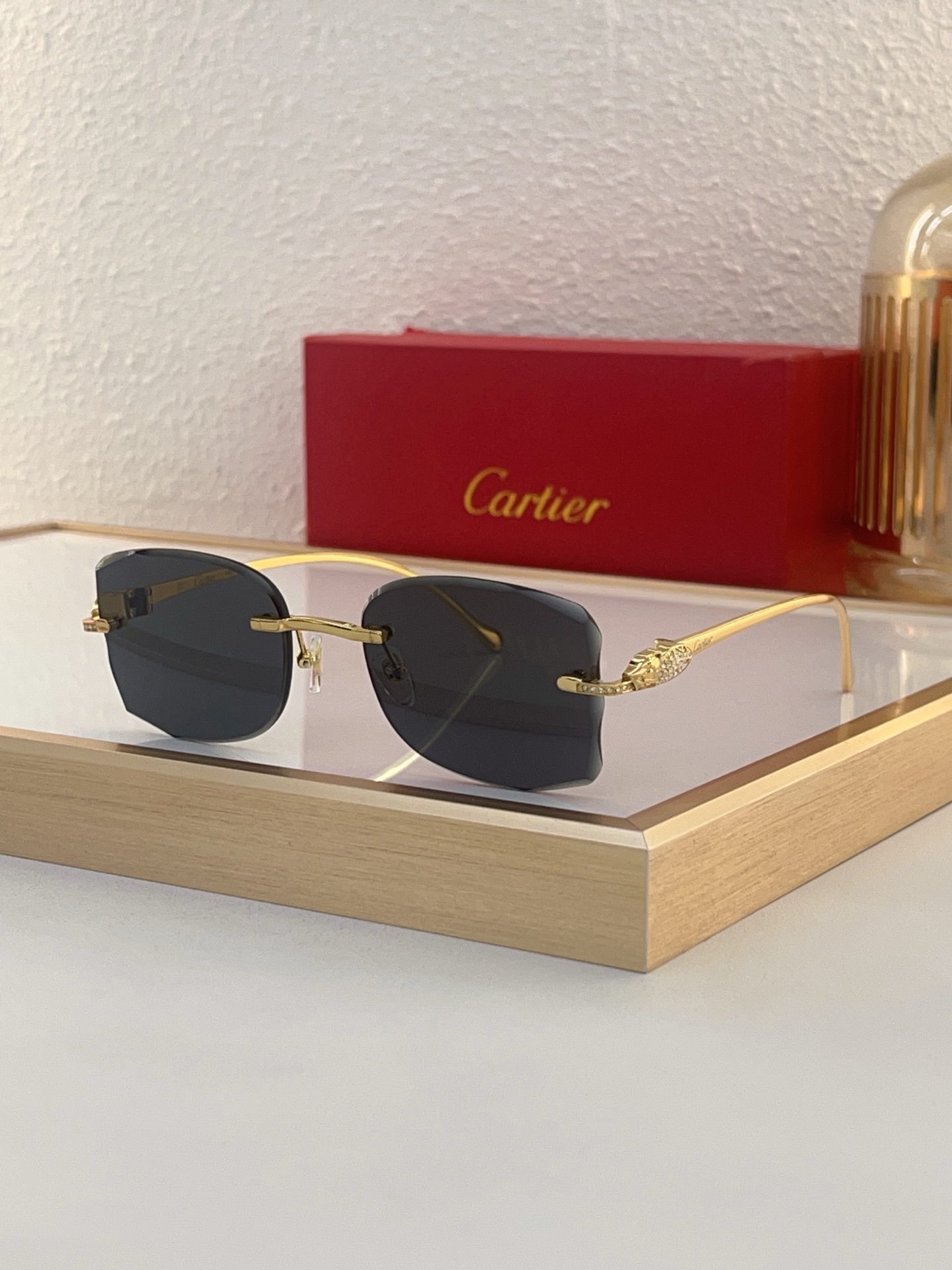 Cartier CT0013S Panthère - Embellished Rimless Sunglasses