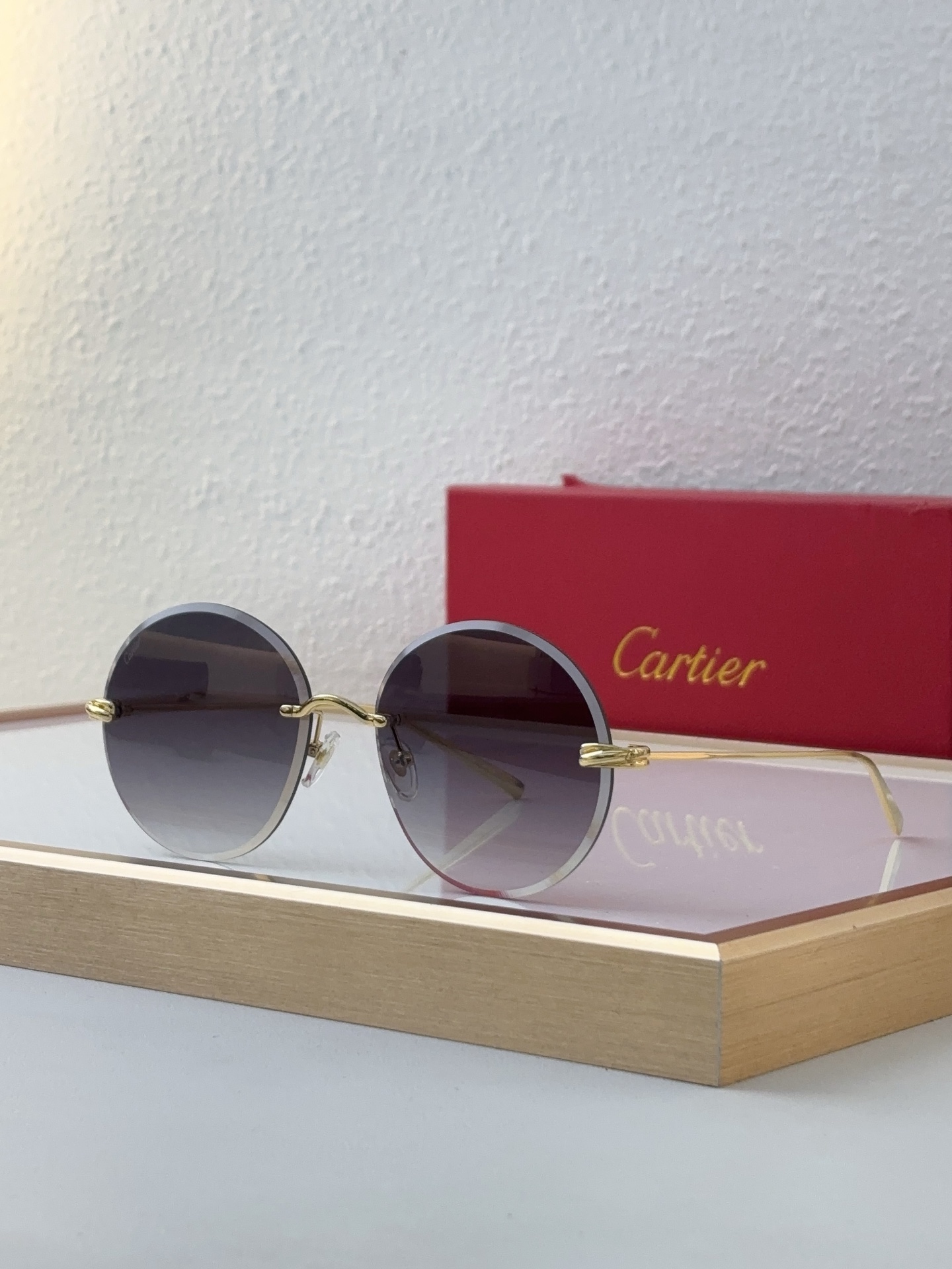 Cartier CT0607S Retro Round Semi - Rimless Sunglasses