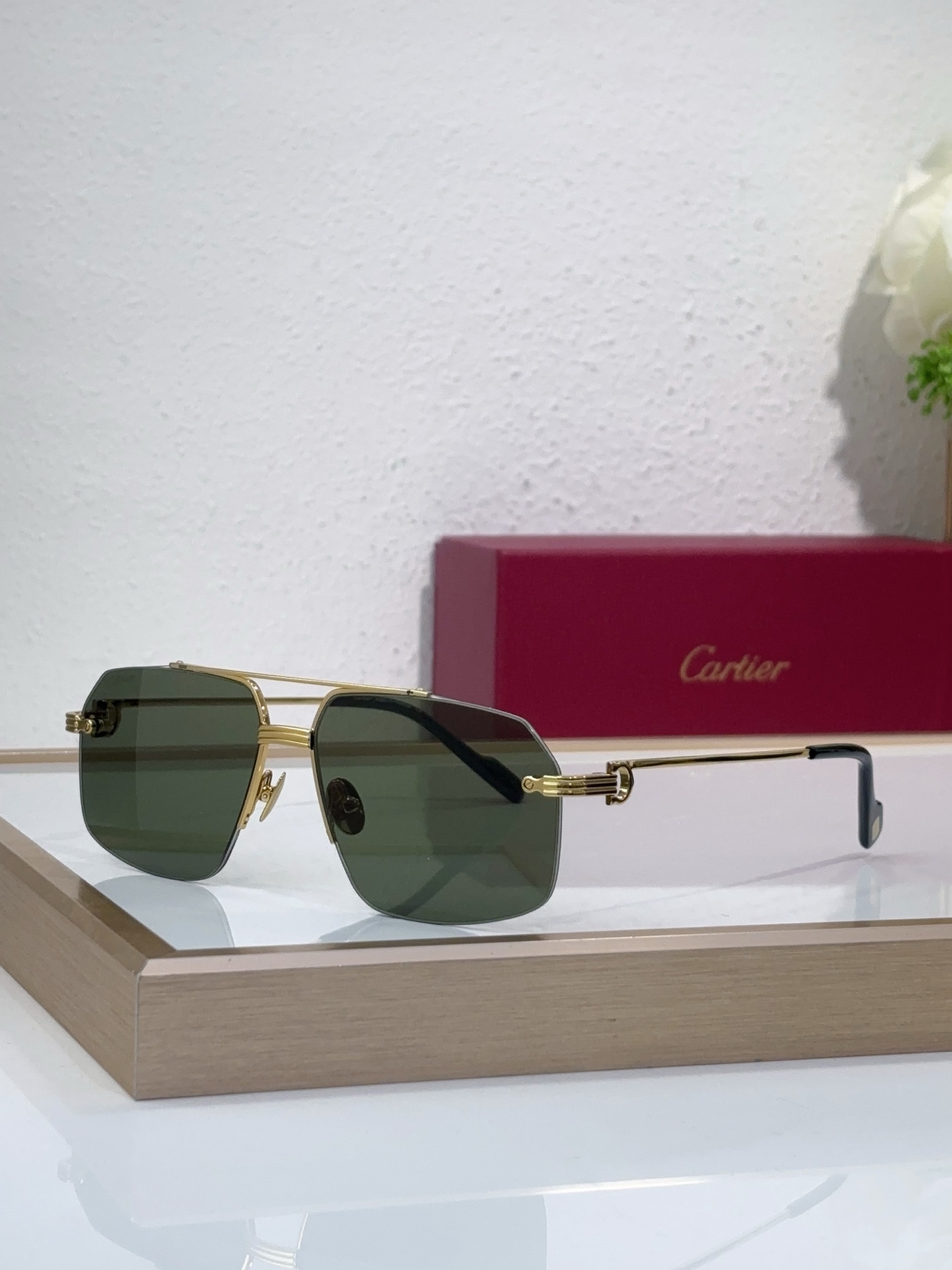 Cartier CT0426S Gold Rimless Navigator Sunglasses