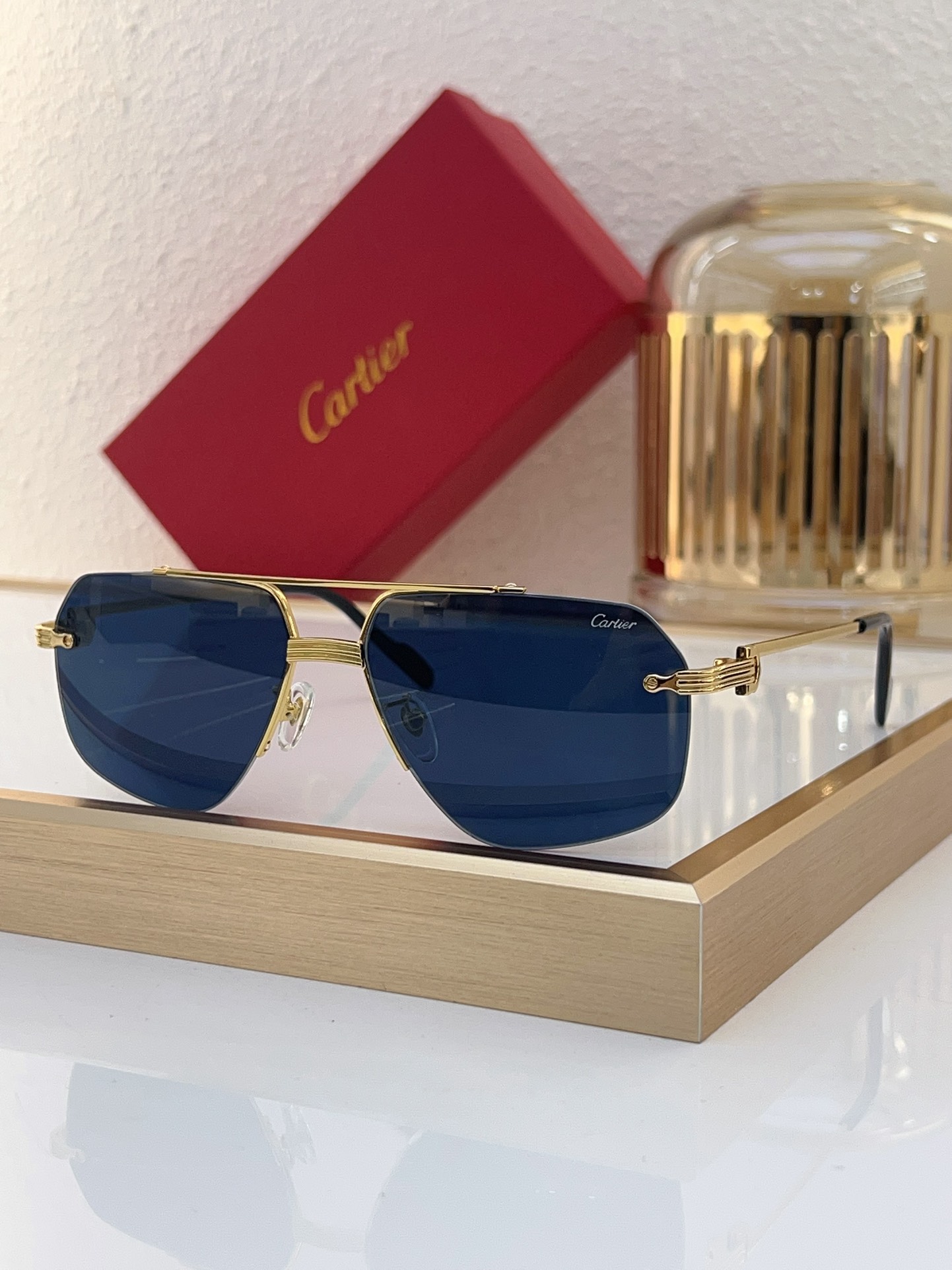 Cartier CT0426S Gold Rimless Navigator Sunglasses