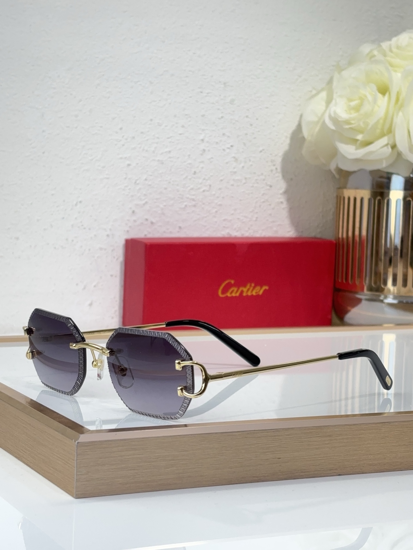 Cartier CT0092O Engraved Rimless Hexagonal Sunglasses