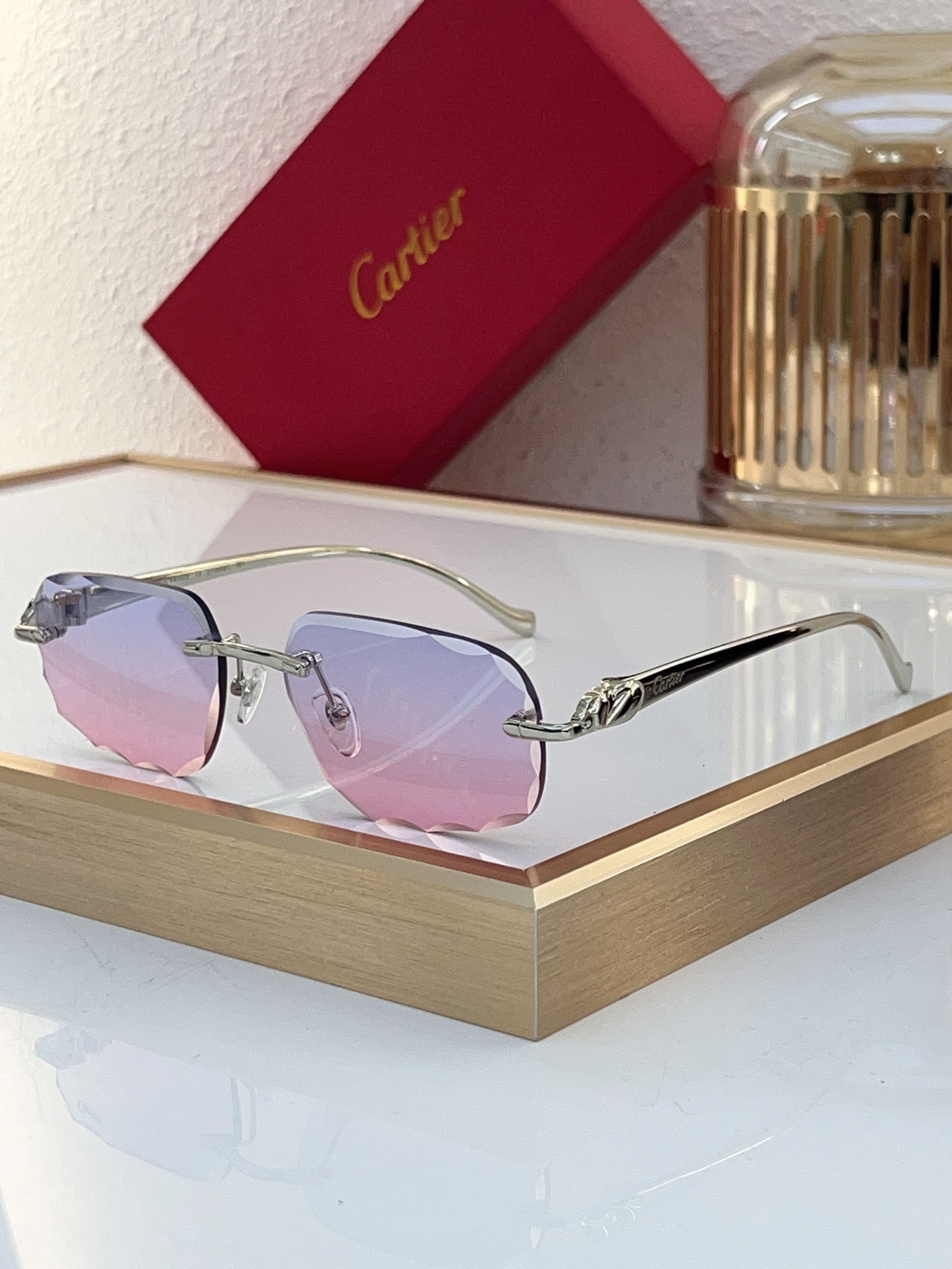 Cartier CT0058O Scalloped-Edge Rimless Sunglasses