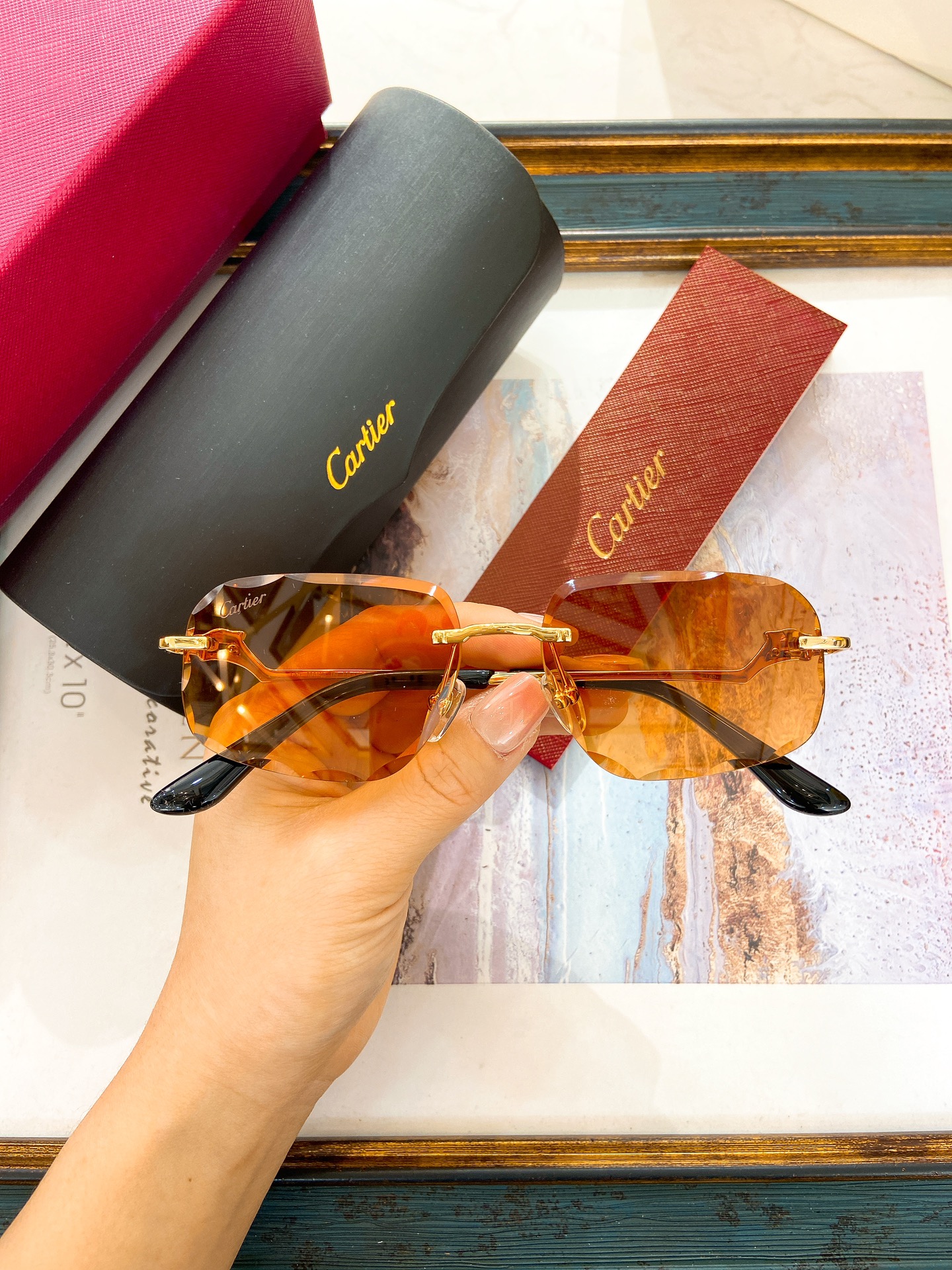 Cartier CT0058O Sculpted Red Gradient Rimless Sunglasses