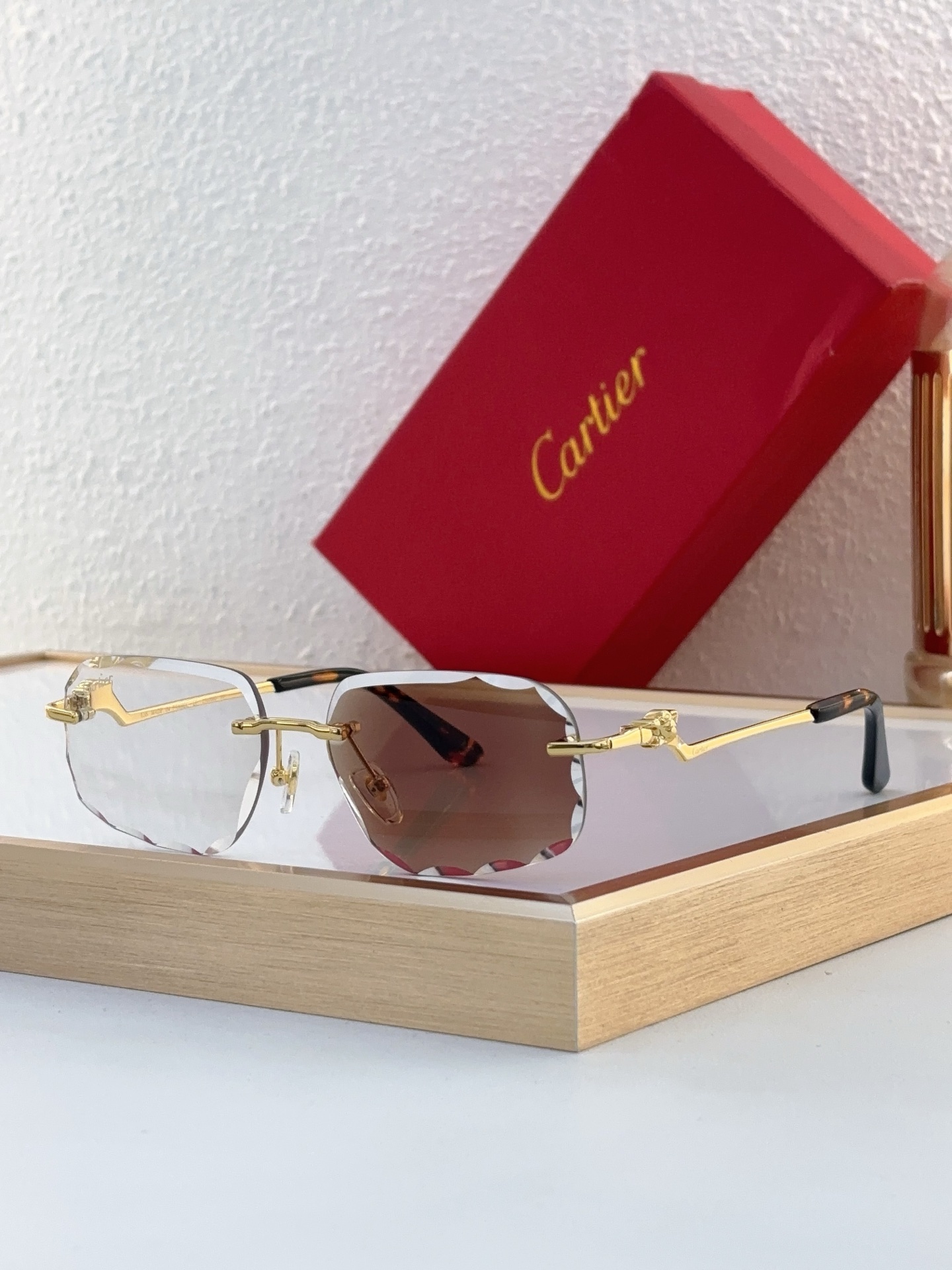 Cartier CT0058O Sculpted Hexagonal Rimless Sunglasses
