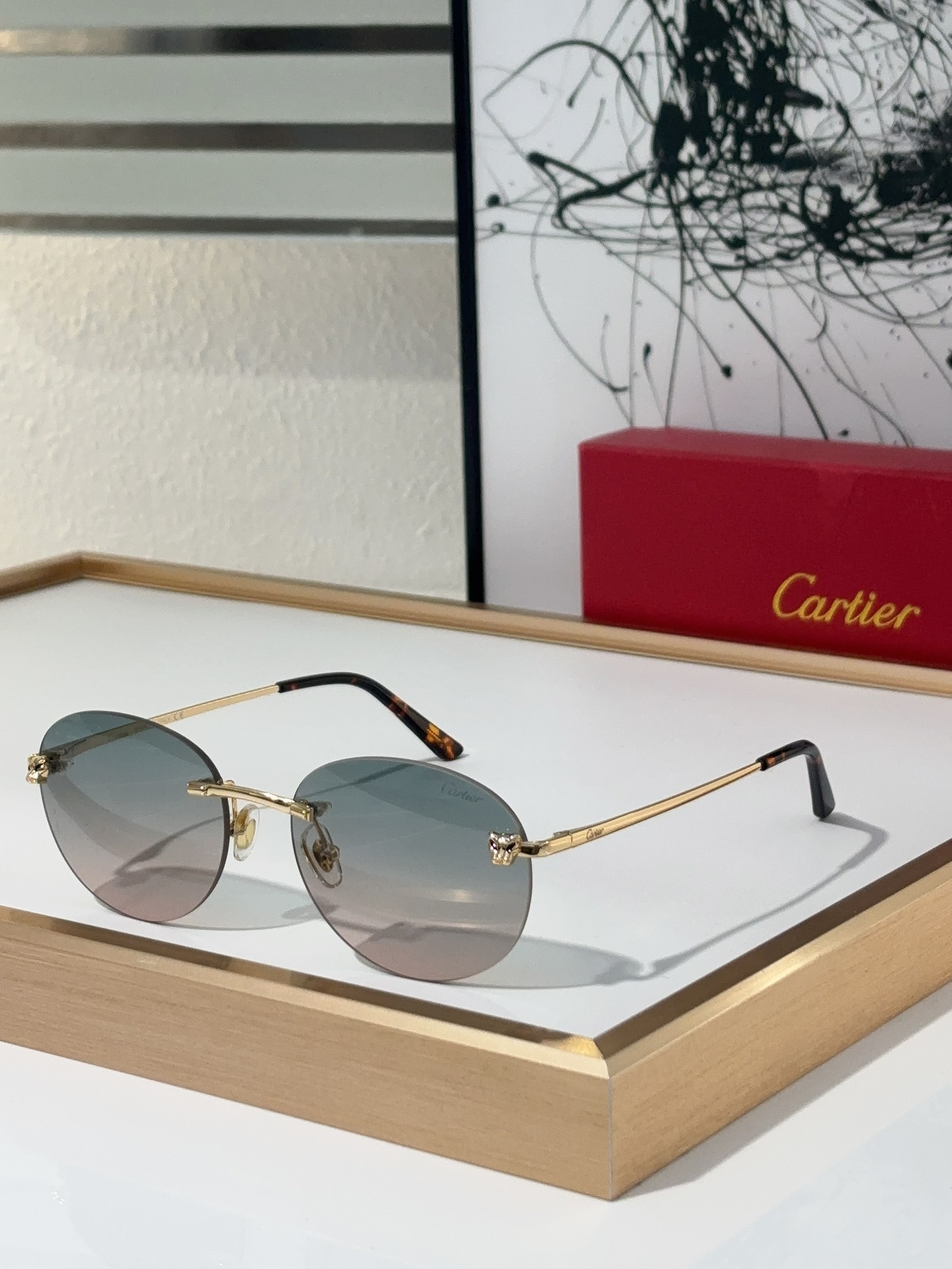 Cartier CT0028O Rimless Round Sunglasses