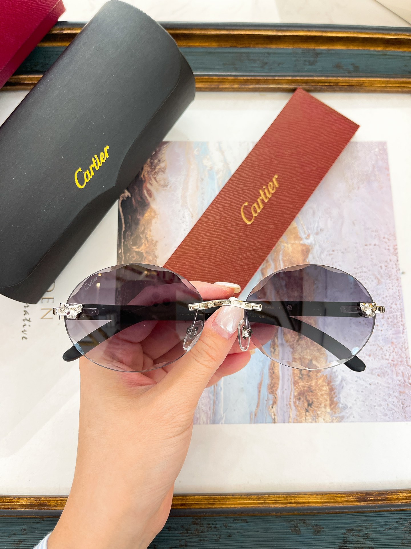 Cartier CT0556S Oval Rimless Sunglasses