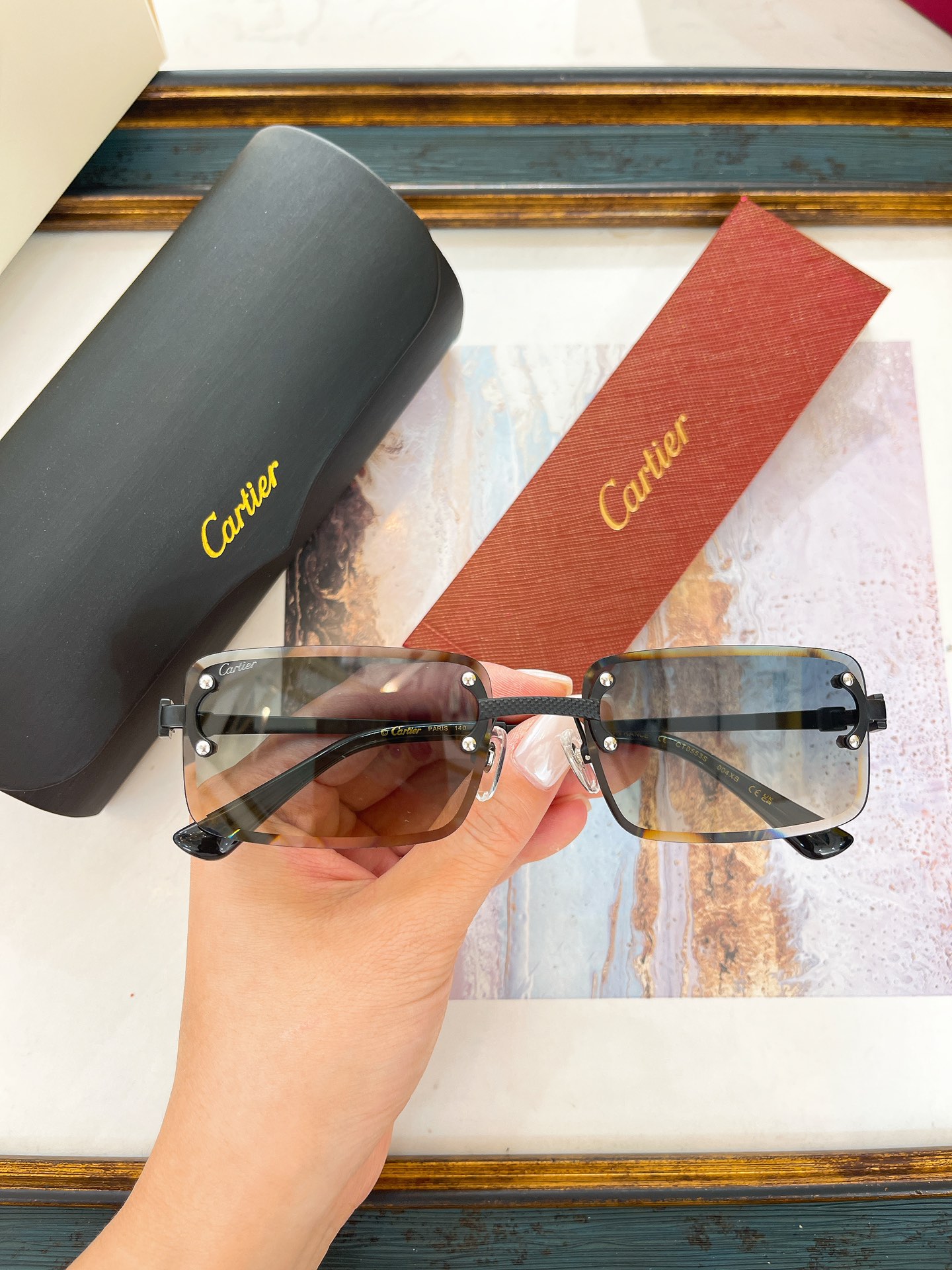Cartier CT0553S Rectangular Rimless Sunglasses