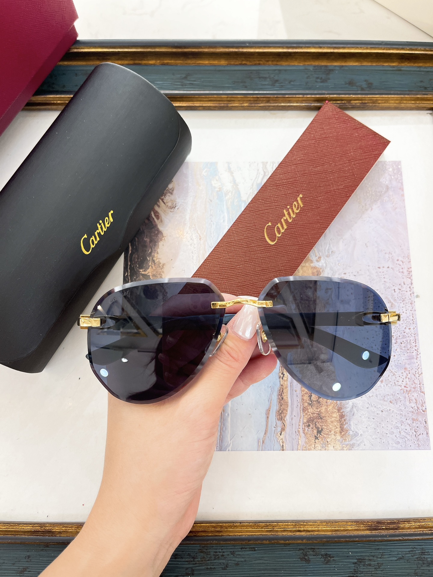 Cartier CT0440S Teardrop Rimless Sunglasses
