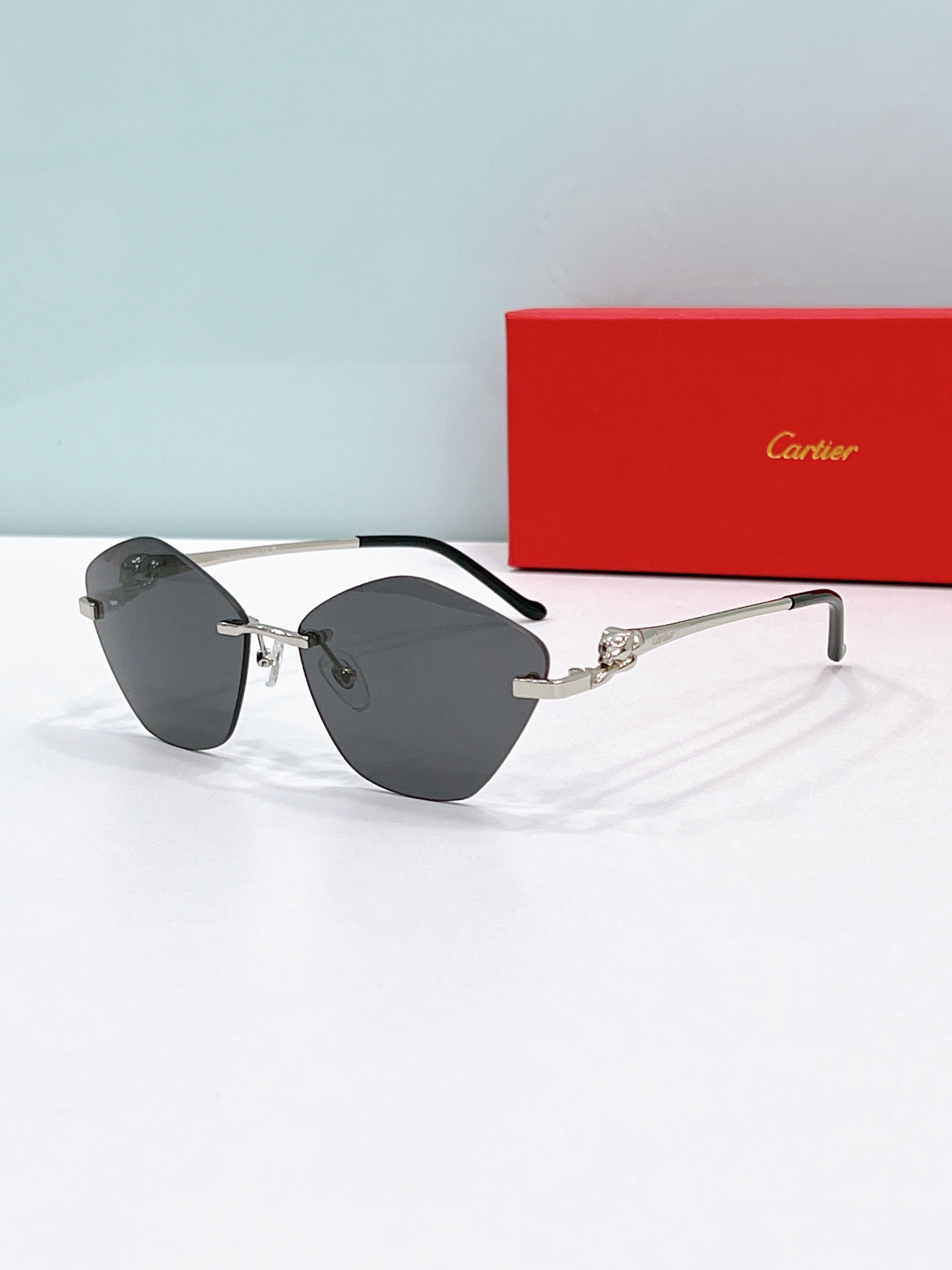 Cartier CT0429S Panther Head Rimless Gradient Sunglasses