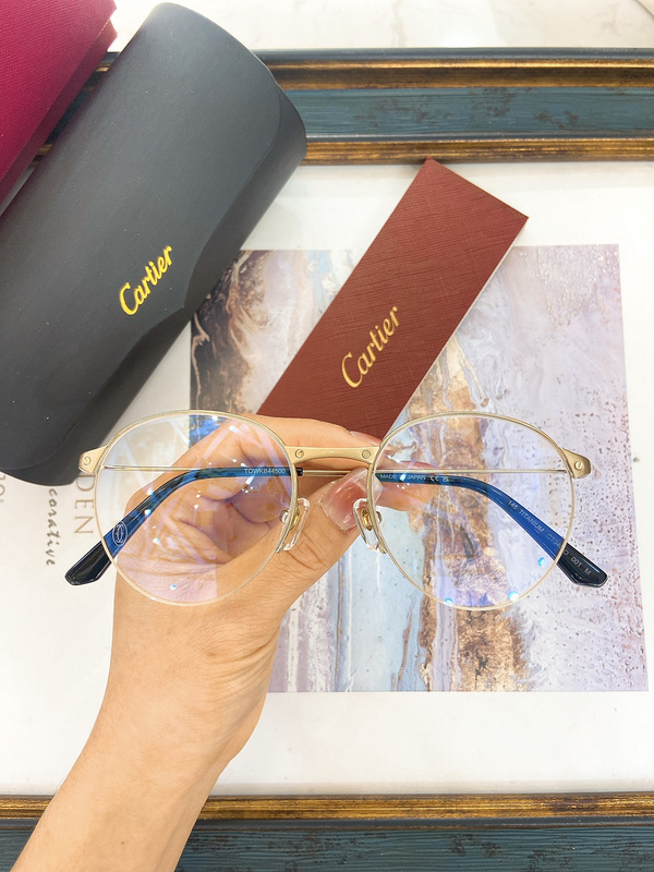 Cartier CT0405O Round Titanium Optical Glasses