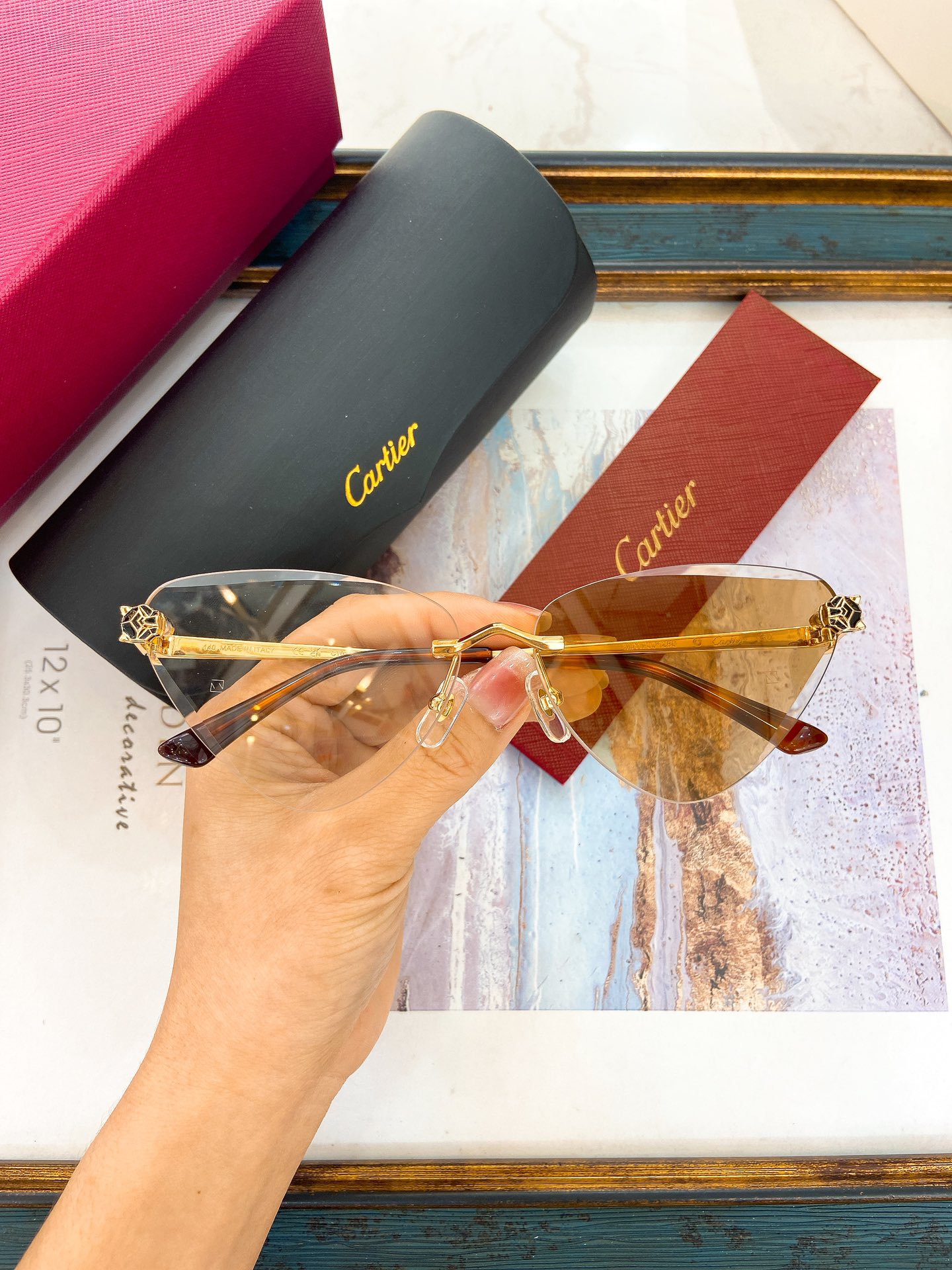 Cartier CT0399S Panther Head Rimless Shield Sunglasses