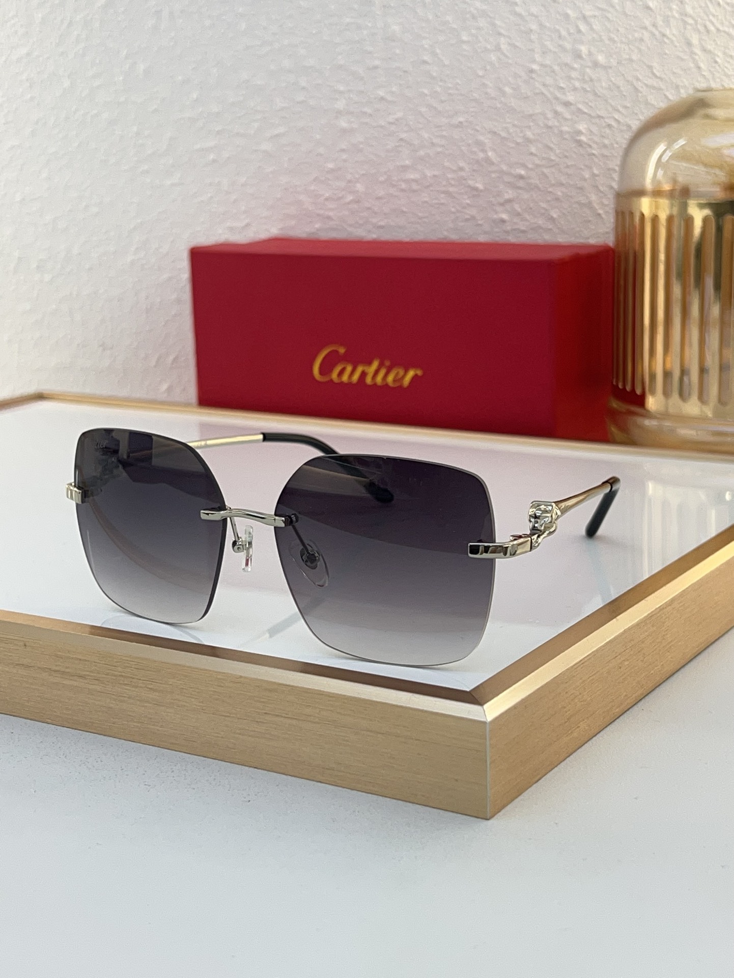Cartier CT0359S Panther Temple Décor Rimless Square Sunglasses