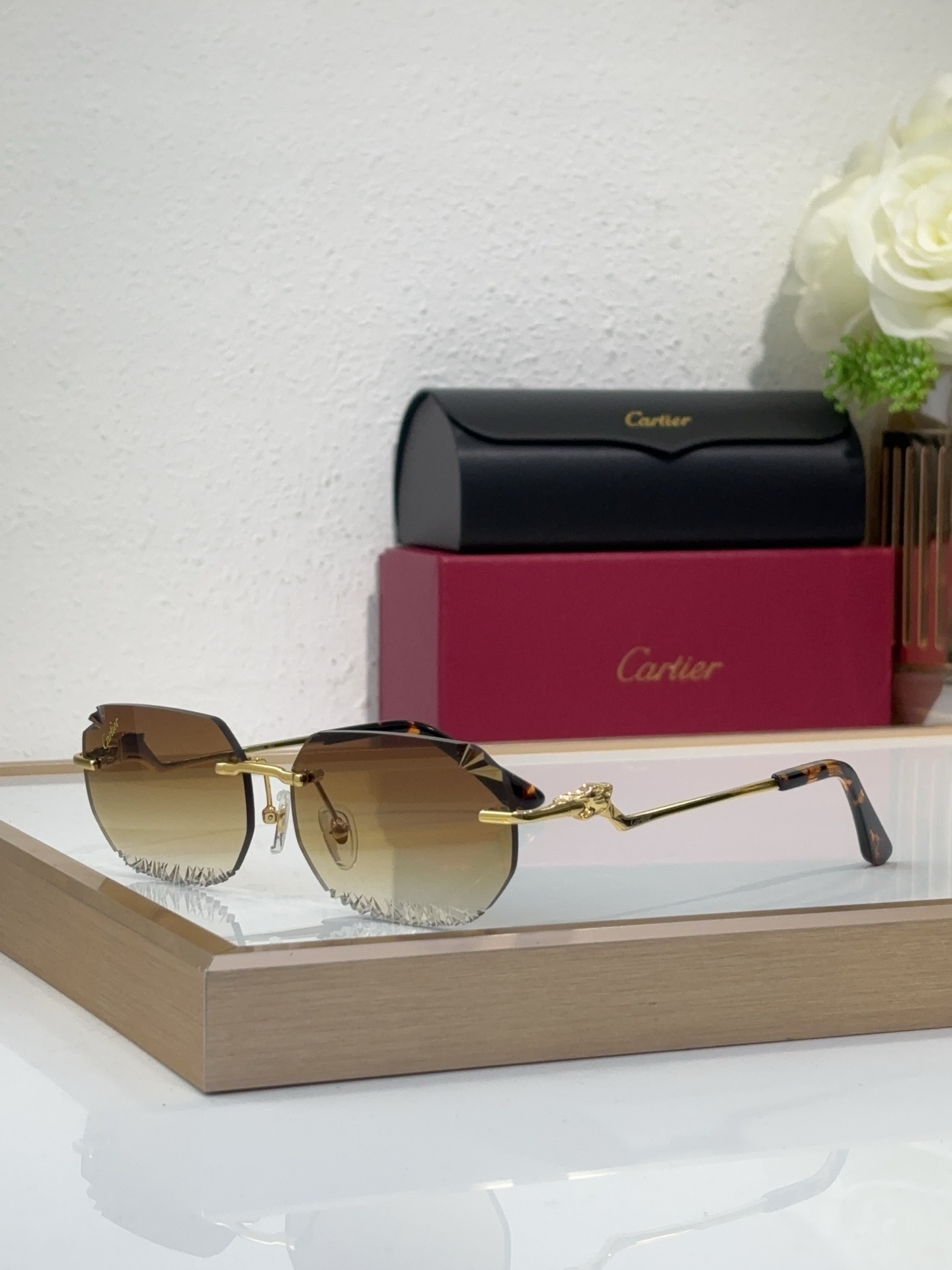 Cartier CT820059O Engraved Rimless Panther Sunglasses