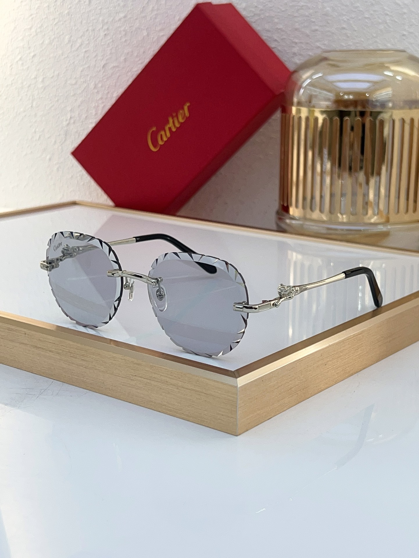 Cartier CT0281S Engraved‑Edge Round Rimless Sunglasses