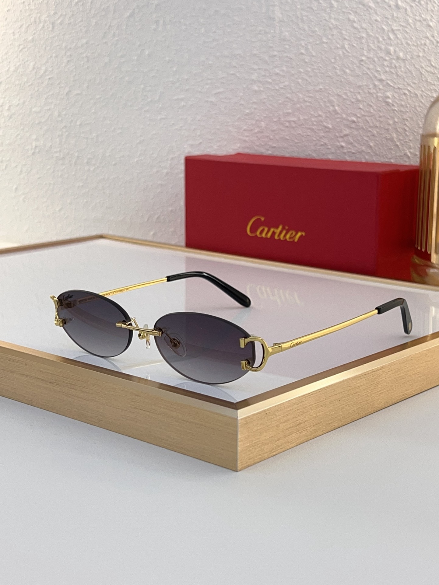 Cartier CT0092 Oval Gradient Rimless Sunglasses