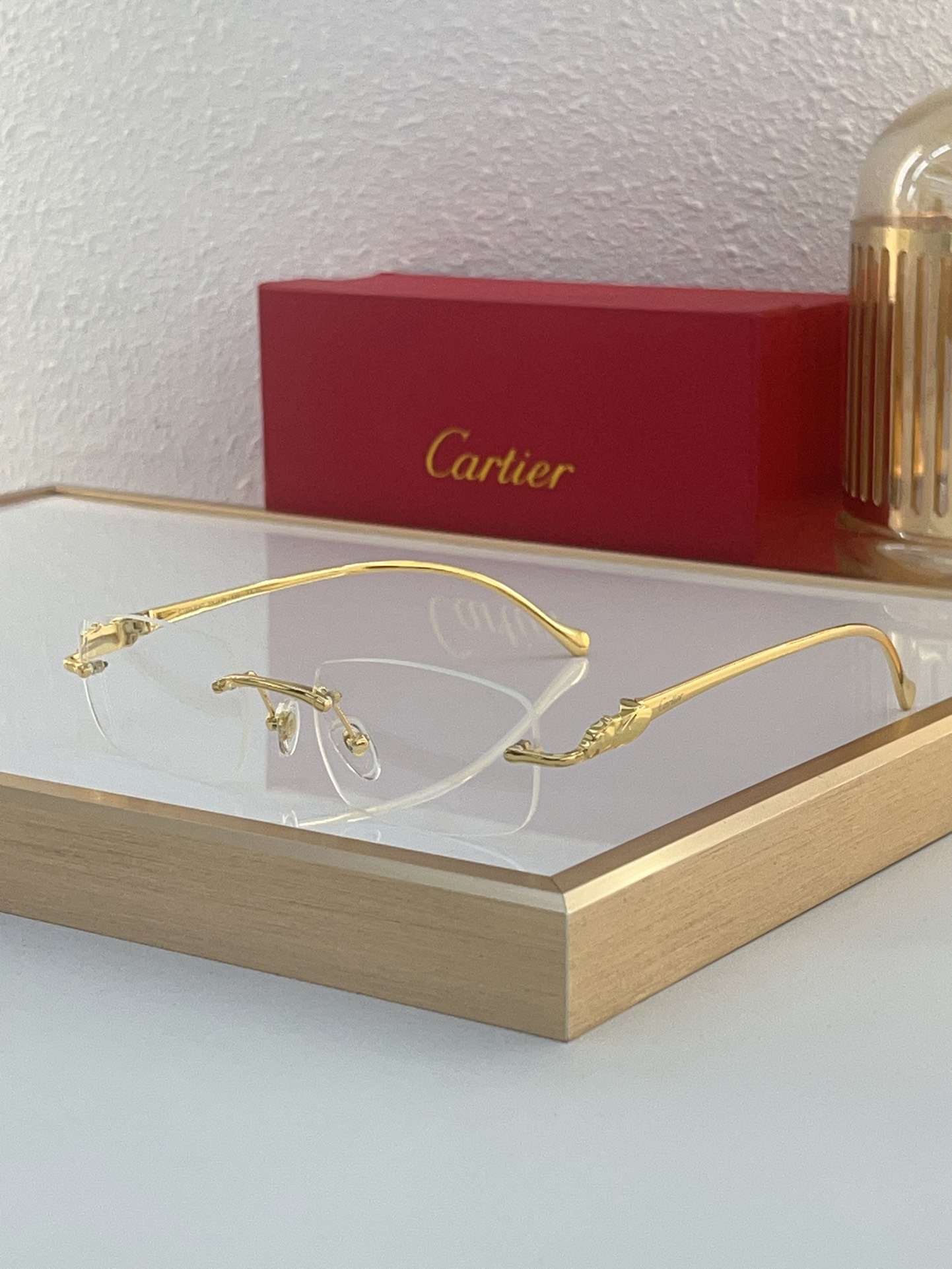Cartier CT0061S Gold Panther Rimless Sunglasses