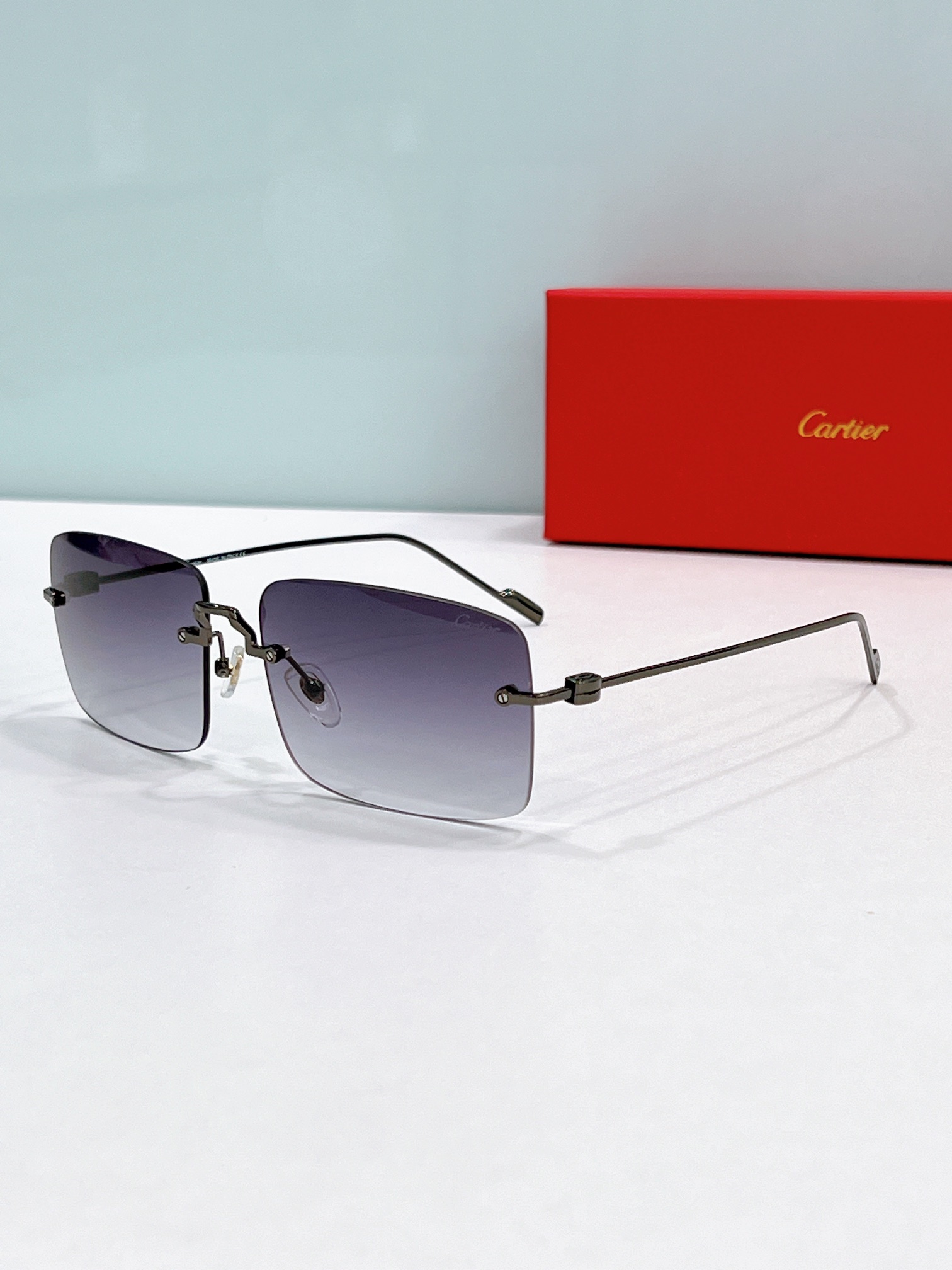 Cartier CT0545 Rimless Rectangular Gold Sunglasses