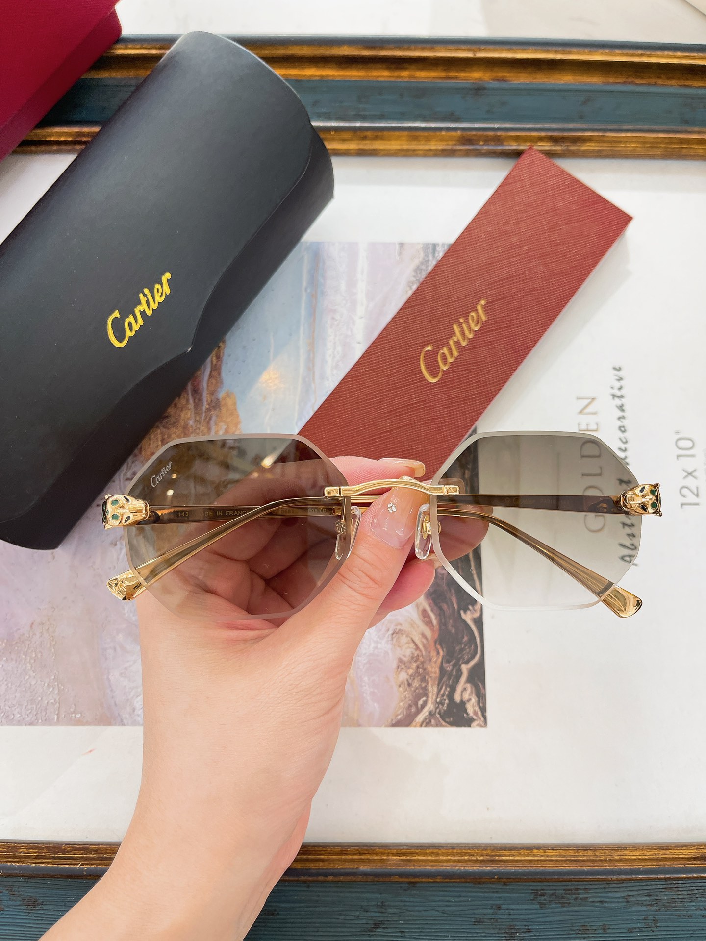 Cartier CT0585S Panther‑Head Rimless Sunglasses